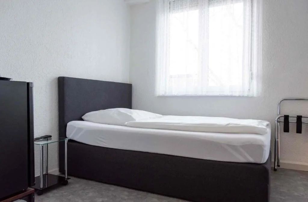 Bed in Cocco-Bello Smart Check-in Hotel