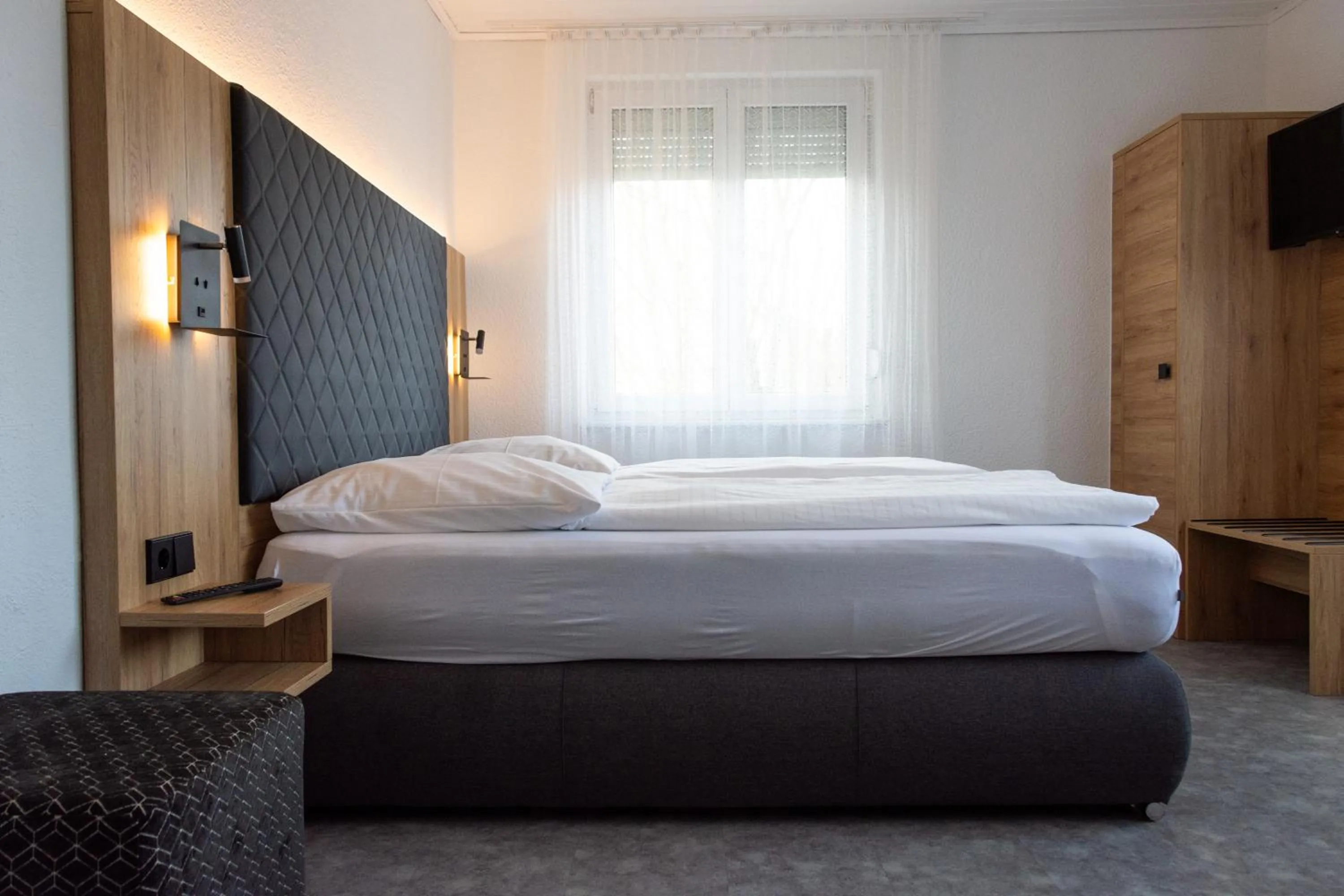 Bed in Hotel-Cocco-Bello in der Villa Foret