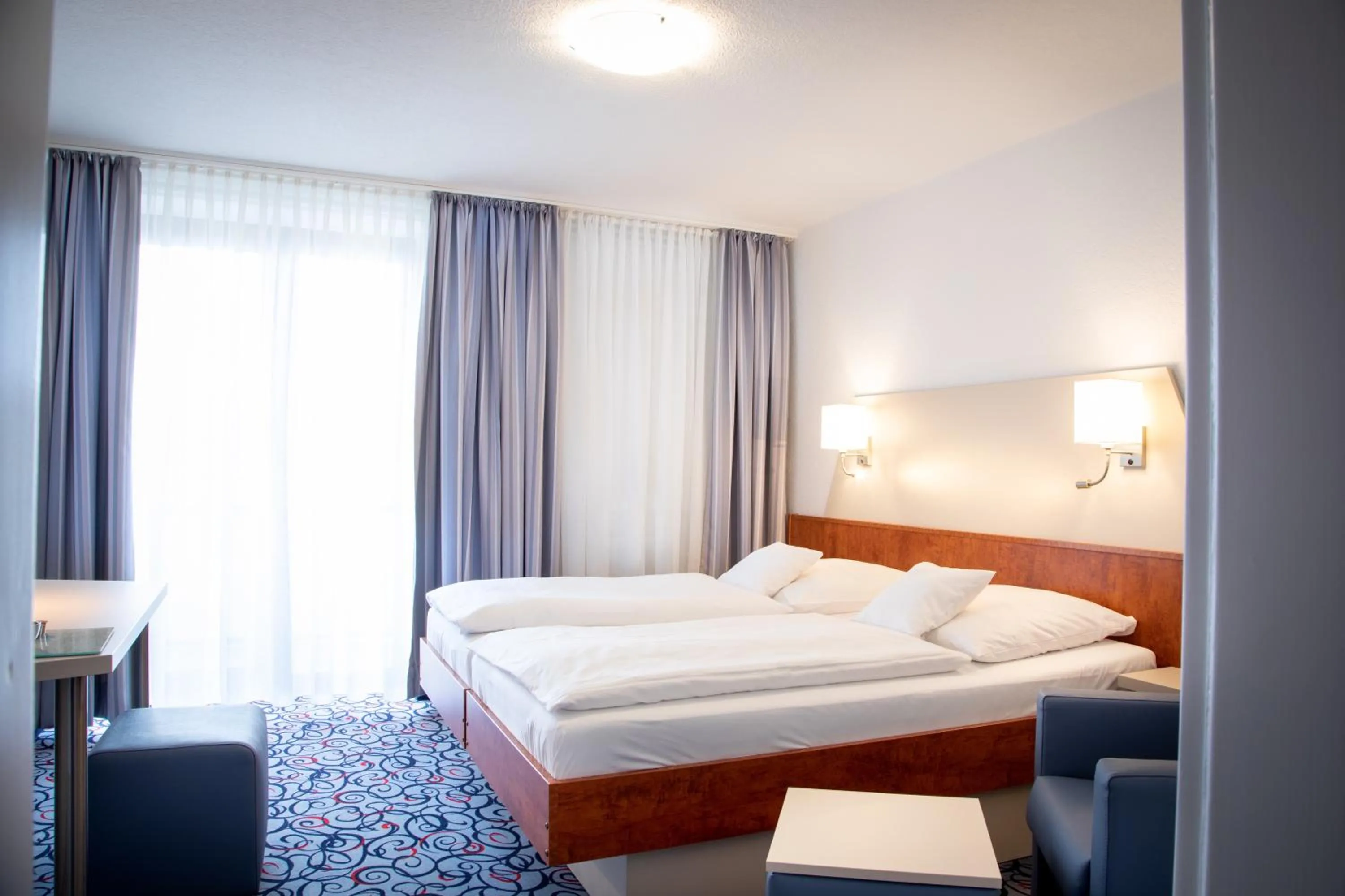 Photo of the whole room, Bed in Pfefferhöhe Hotel & Restaurant
