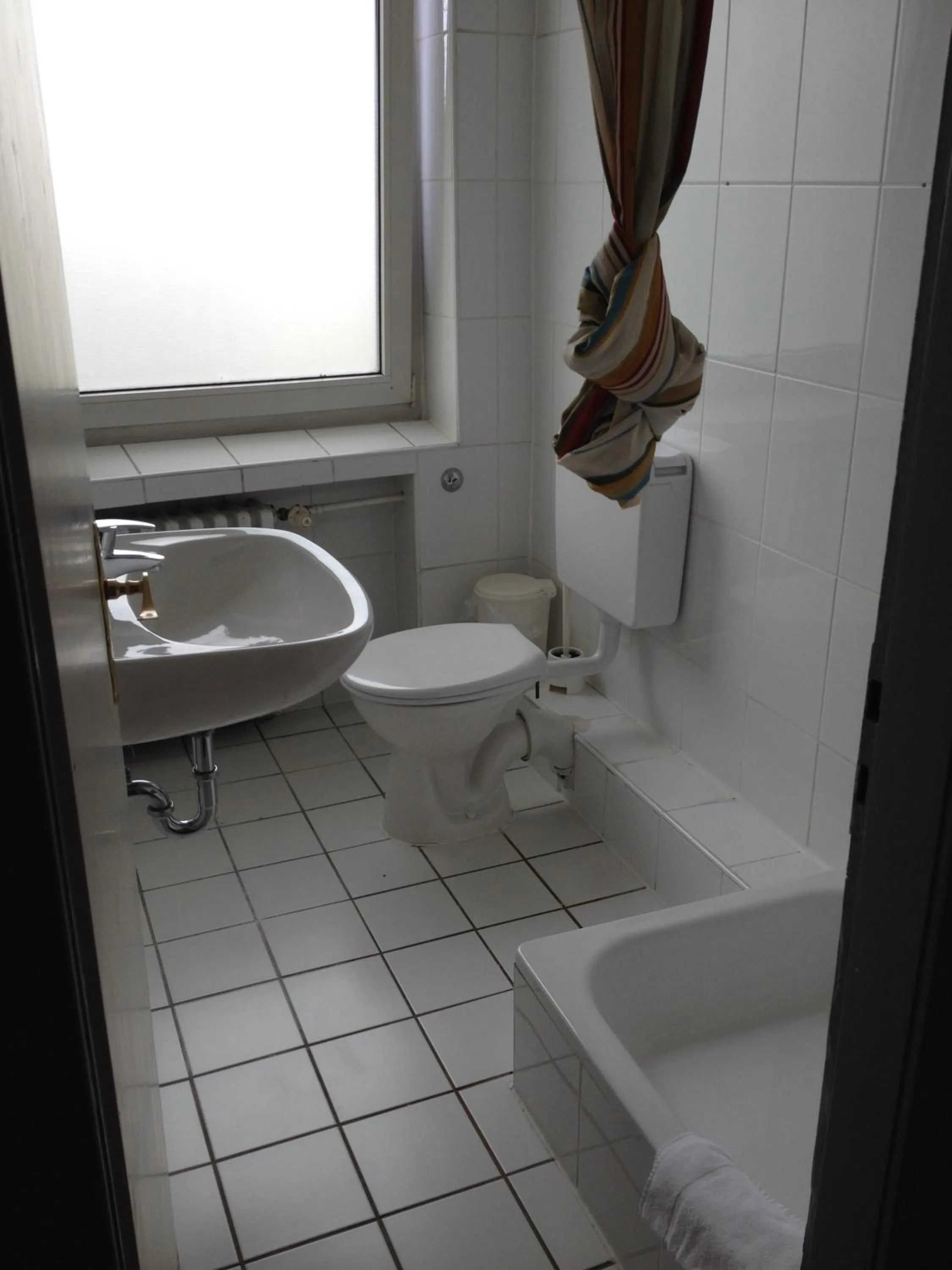 Toilet in Domo Hotel Mondial