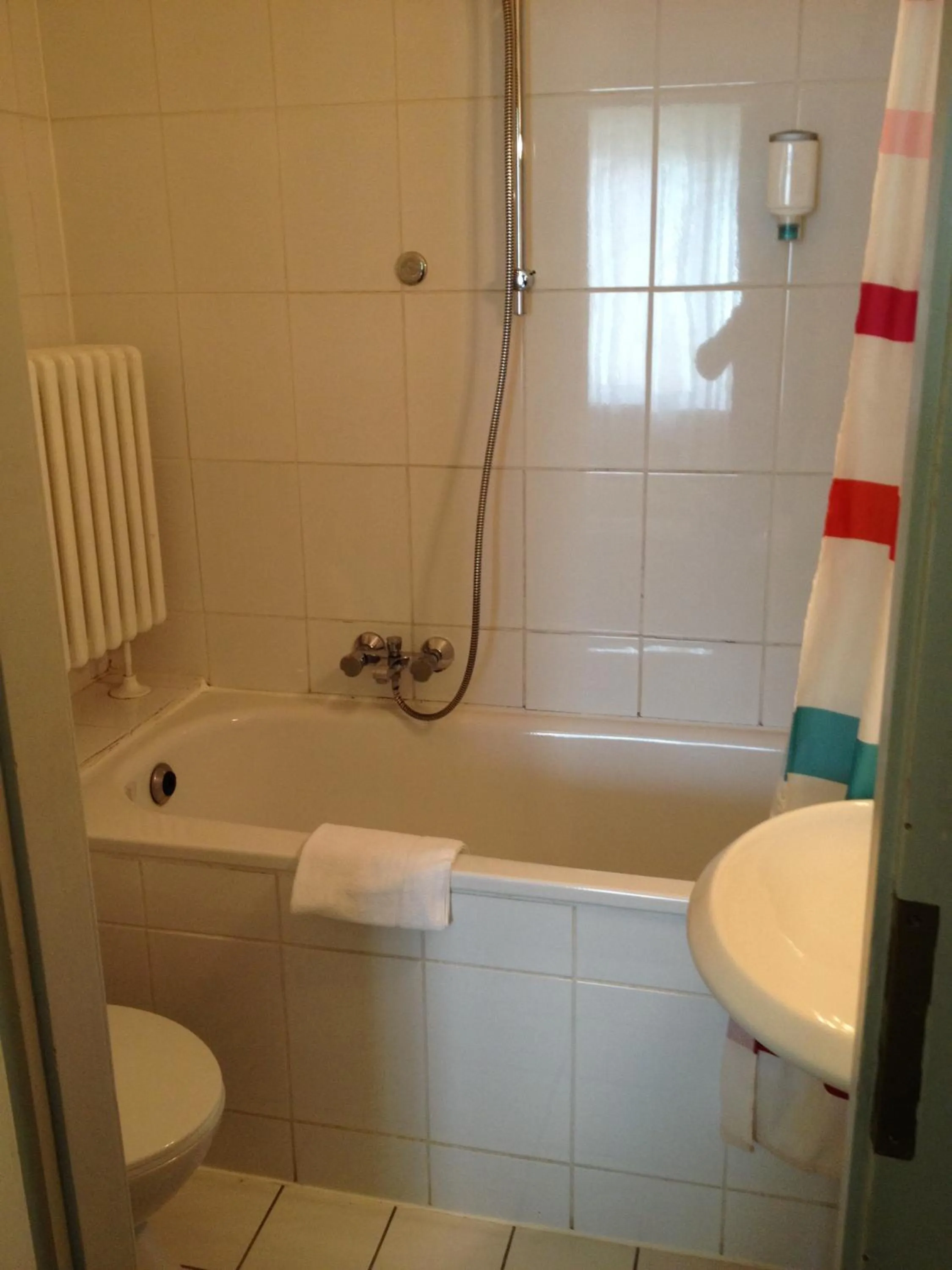 Bathroom in Domo Hotel Mondial