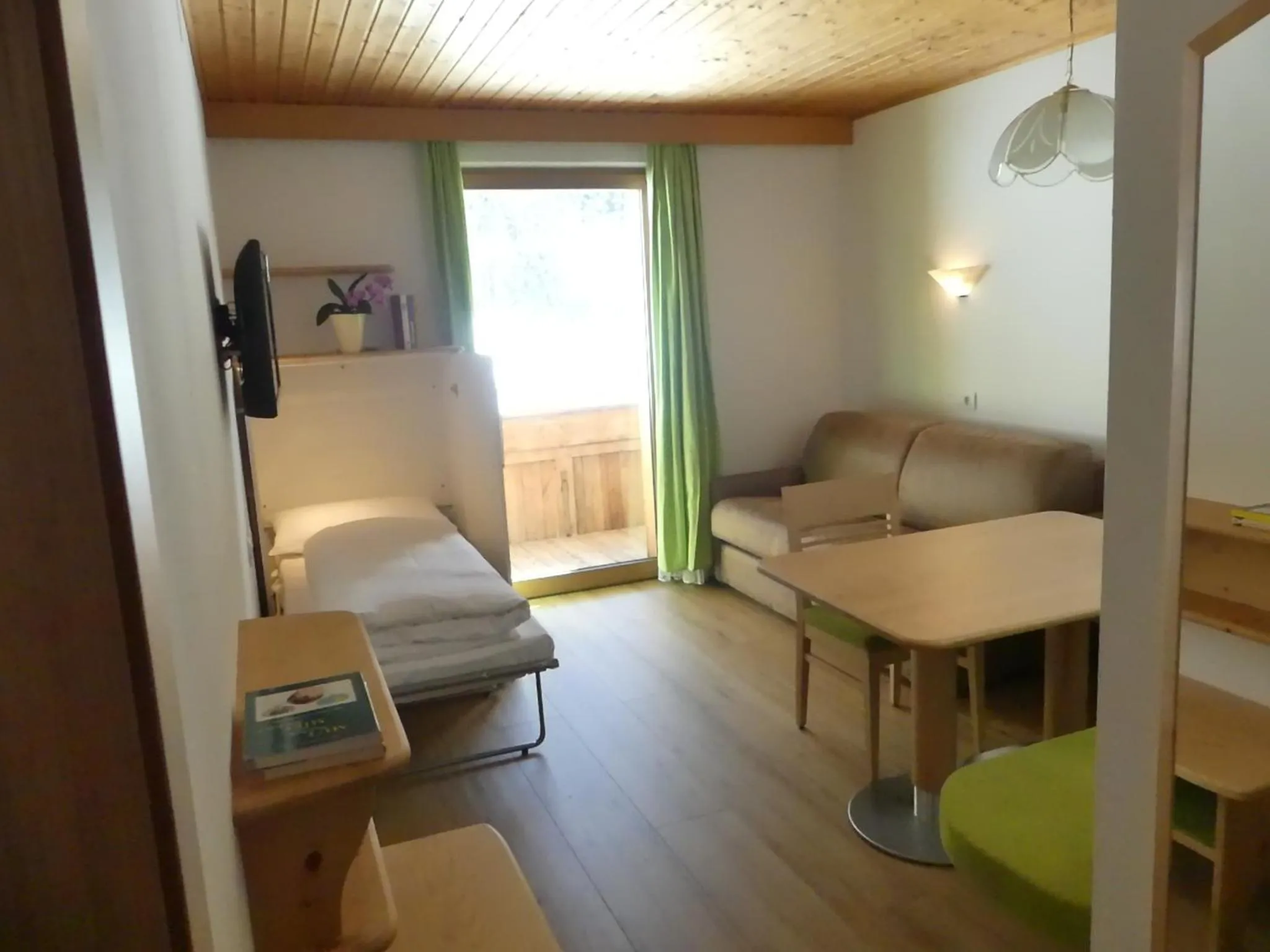 Living room, Bed in Residence Bannwald