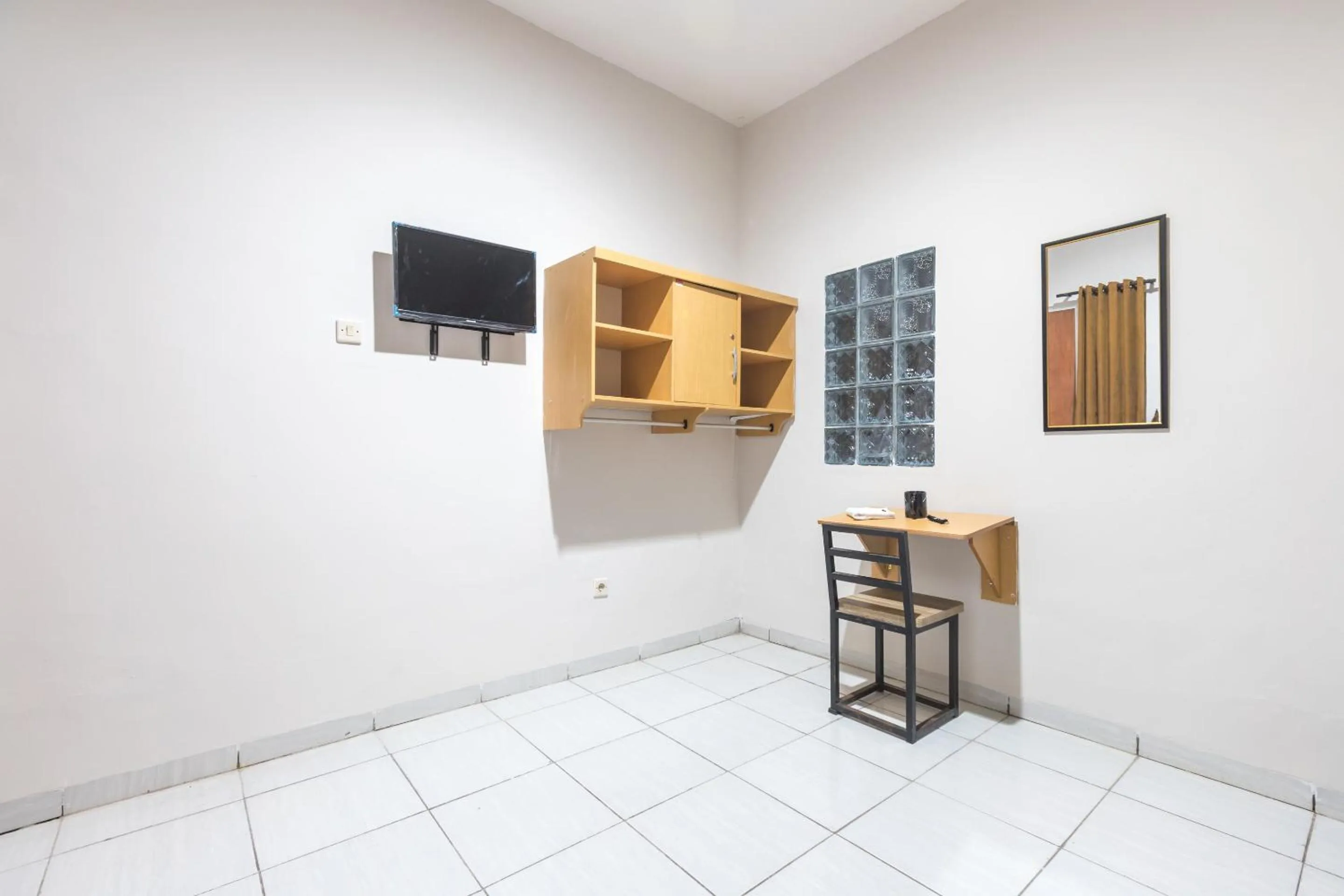 Bedroom in Maminoti Syariah Residence Mitra RedDoorz