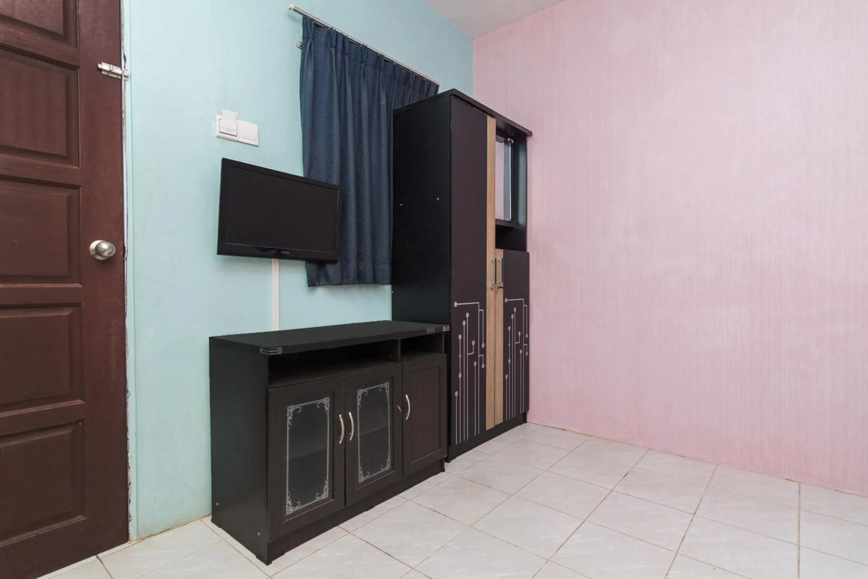 Bedroom in OYO Life 2466 Galaxy Kost