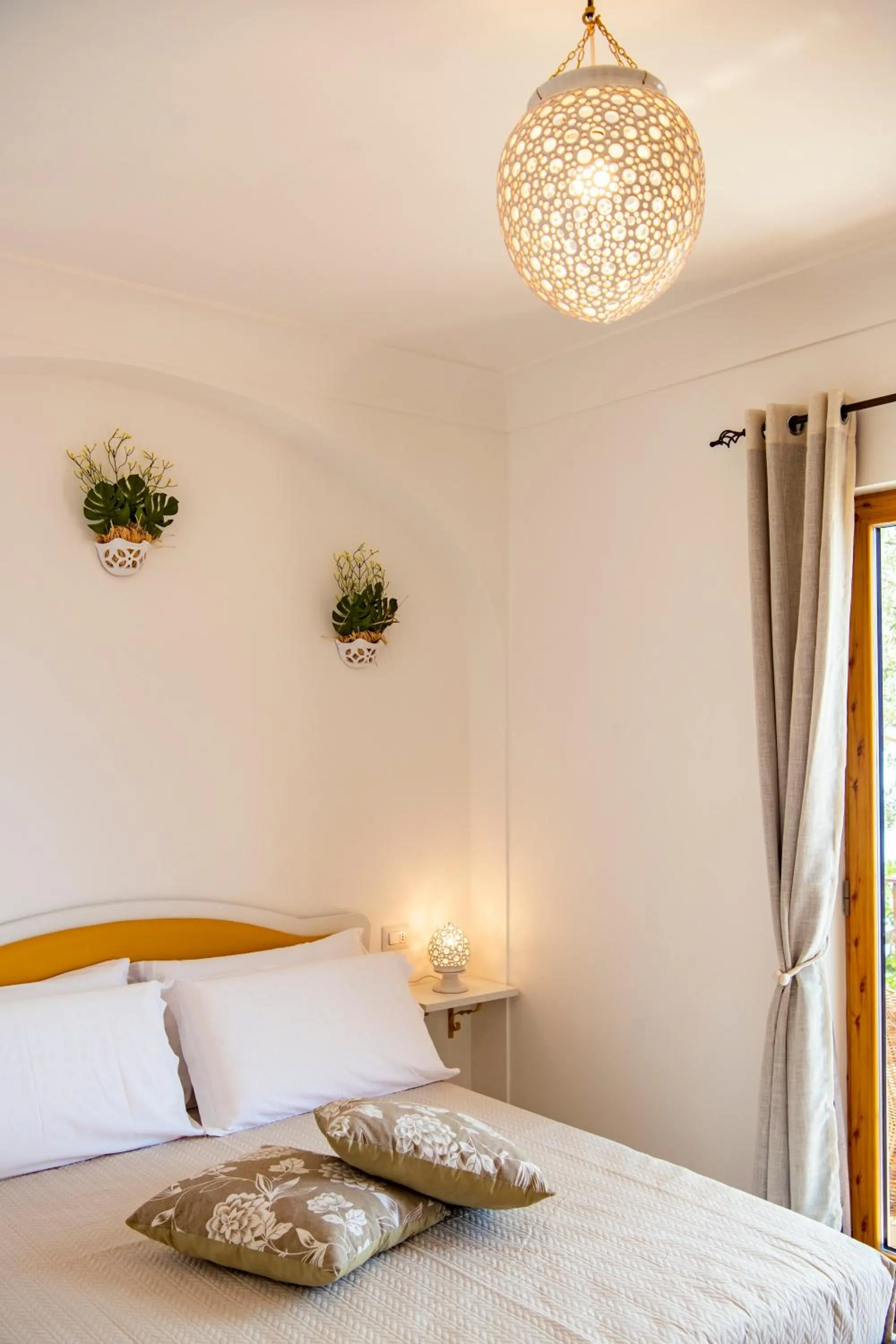 Bed in La Borragine Rooms