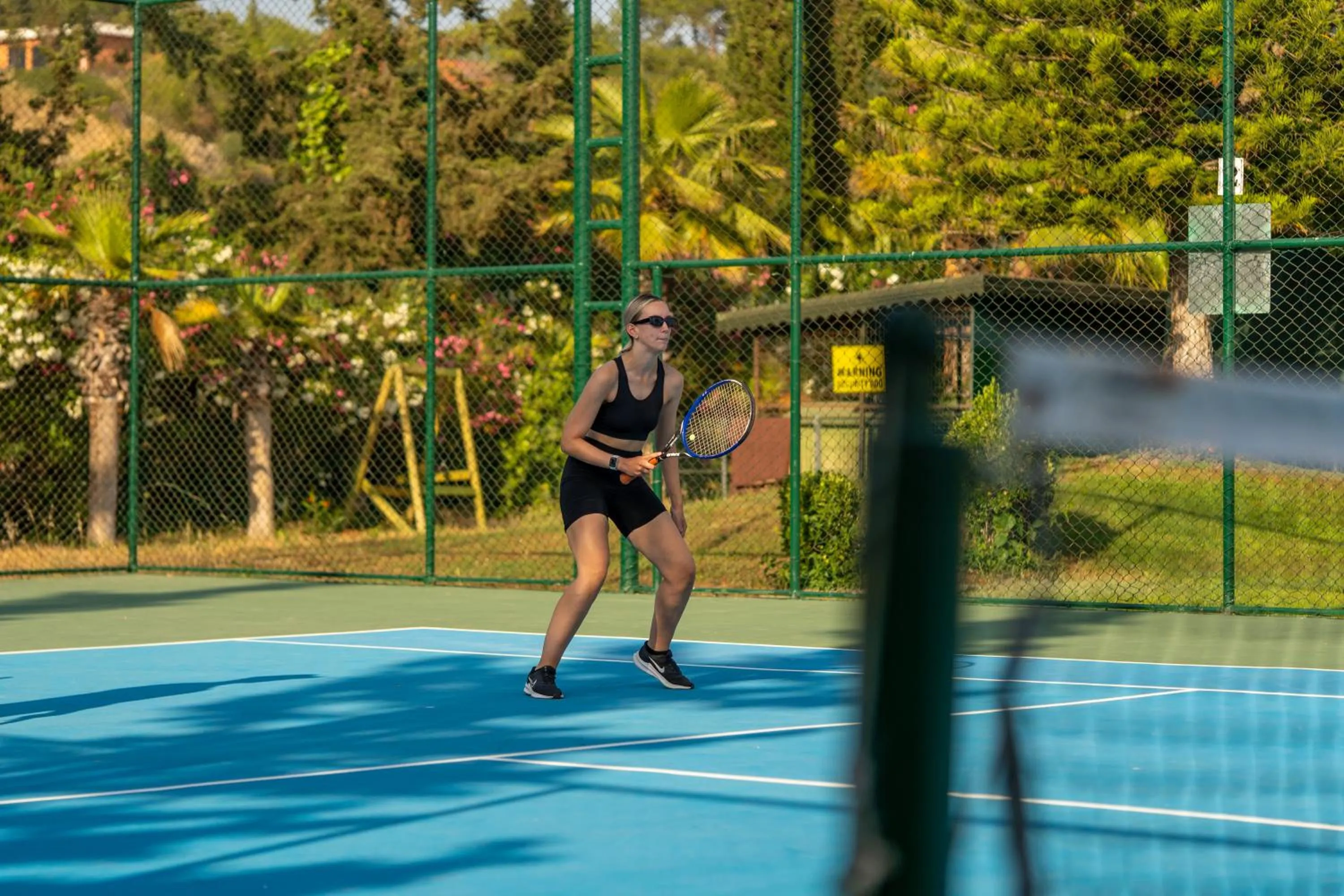 Tennis court in AQI Pegasos Resort