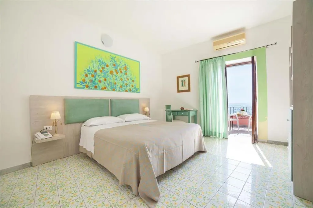 Bed in Hotel Casa Rosa Sea & Spa