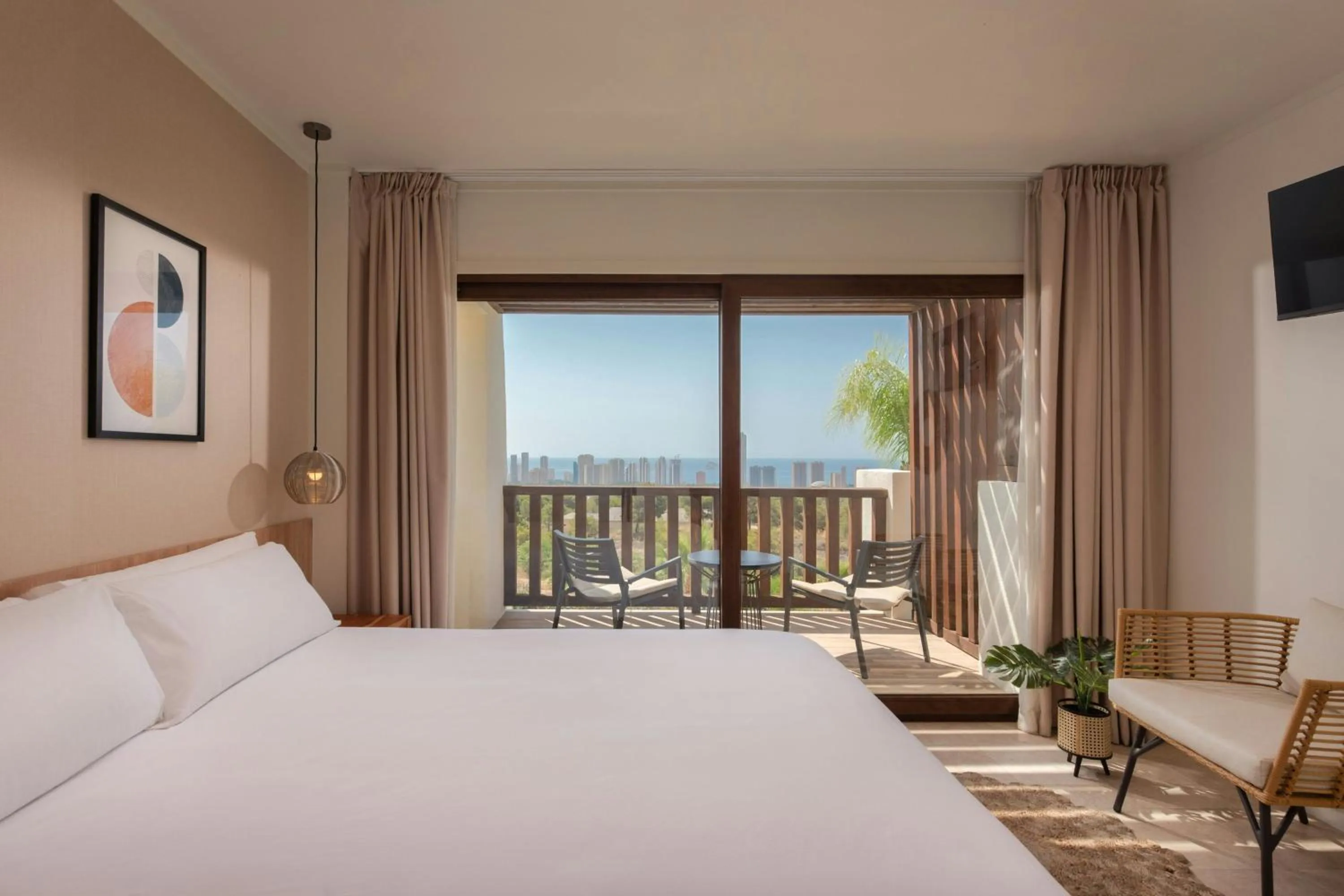 Photo of the whole room, Bed in Four Points by Sheraton Costa Blanca Villas