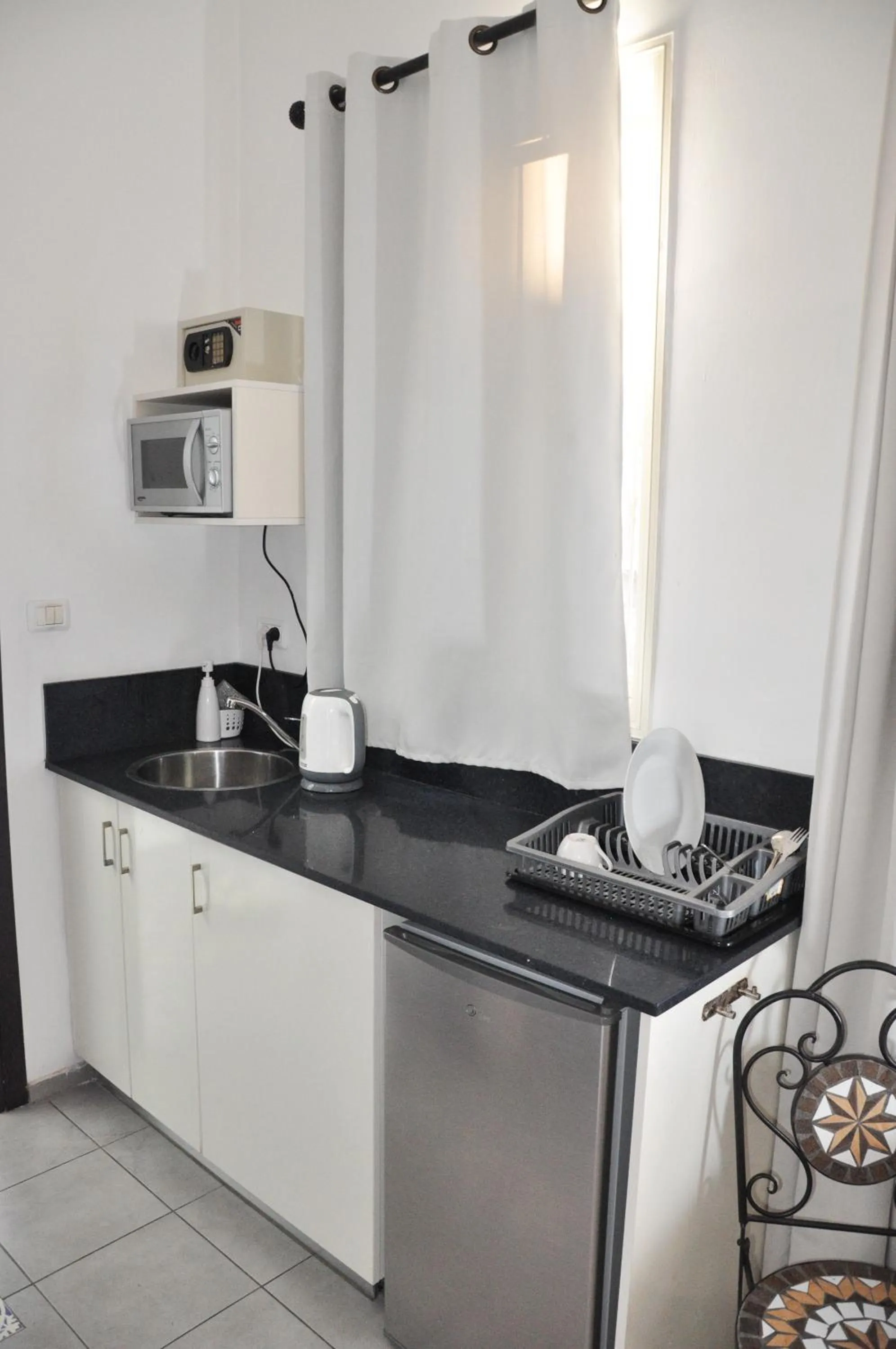 Kitchen or kitchenette in City Center Apartments