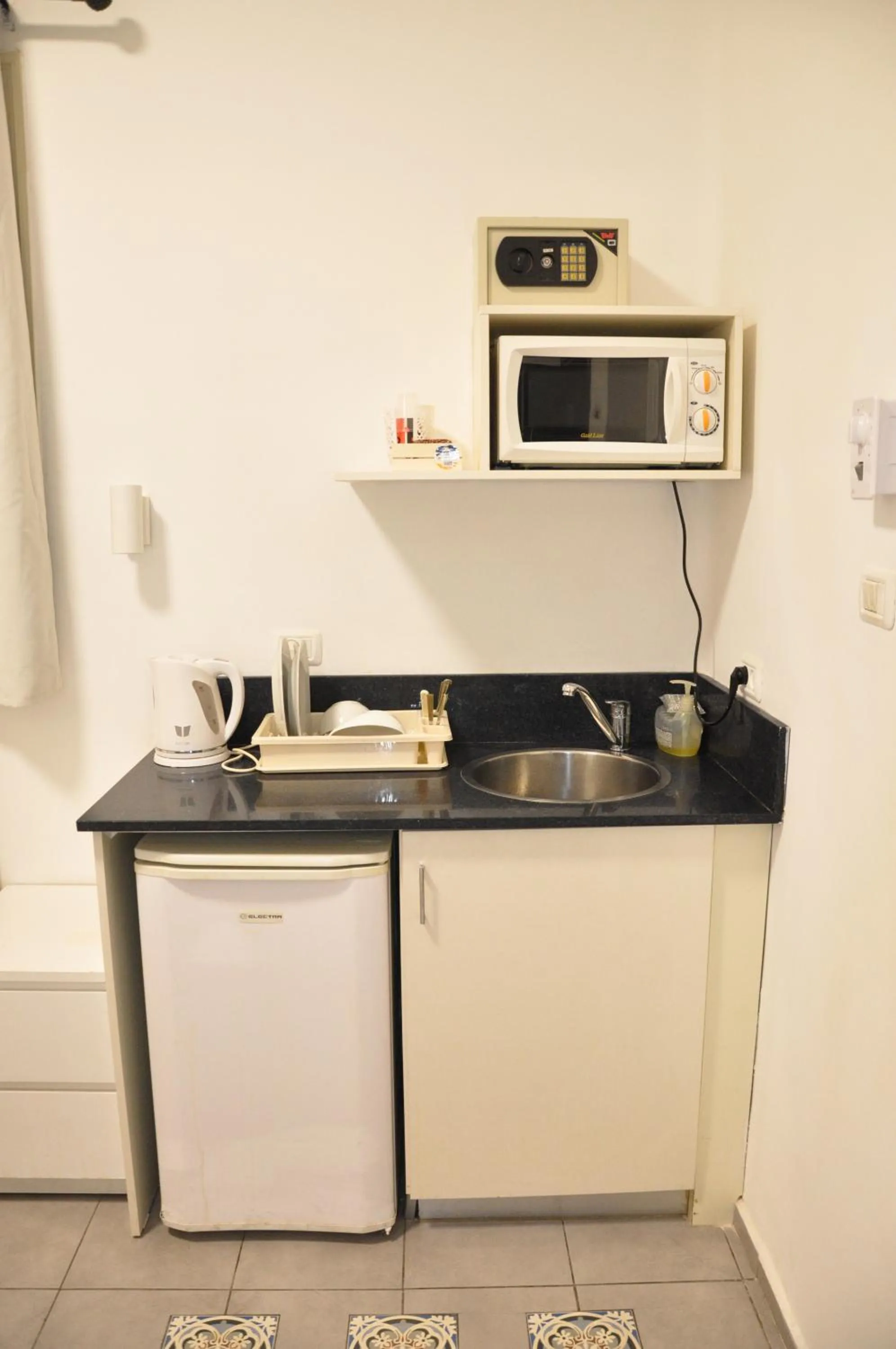 Kitchen or kitchenette in City Center Apartments