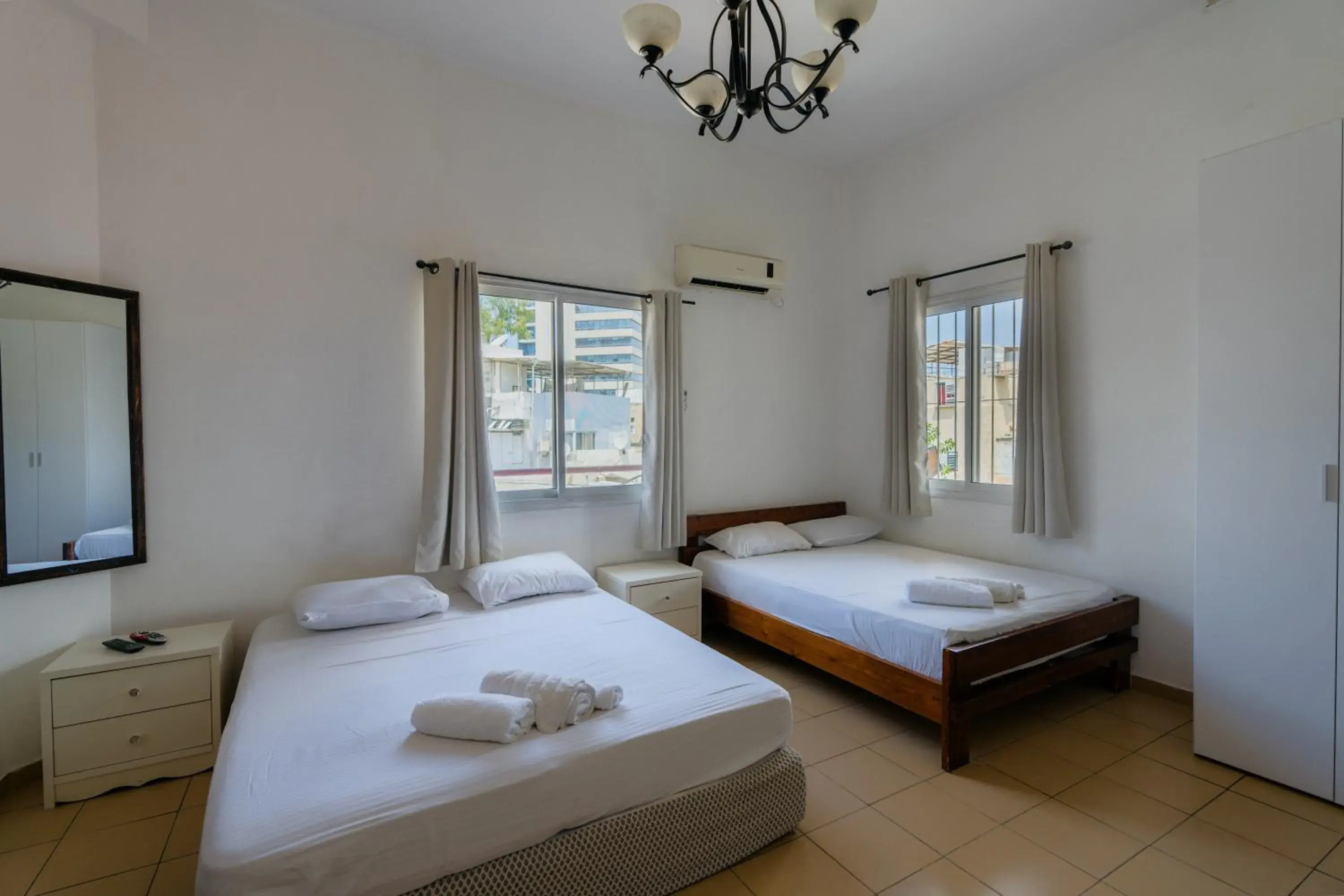 Classic Triple Room in City Center Apartments Classic Triple Room in City Center Apartments