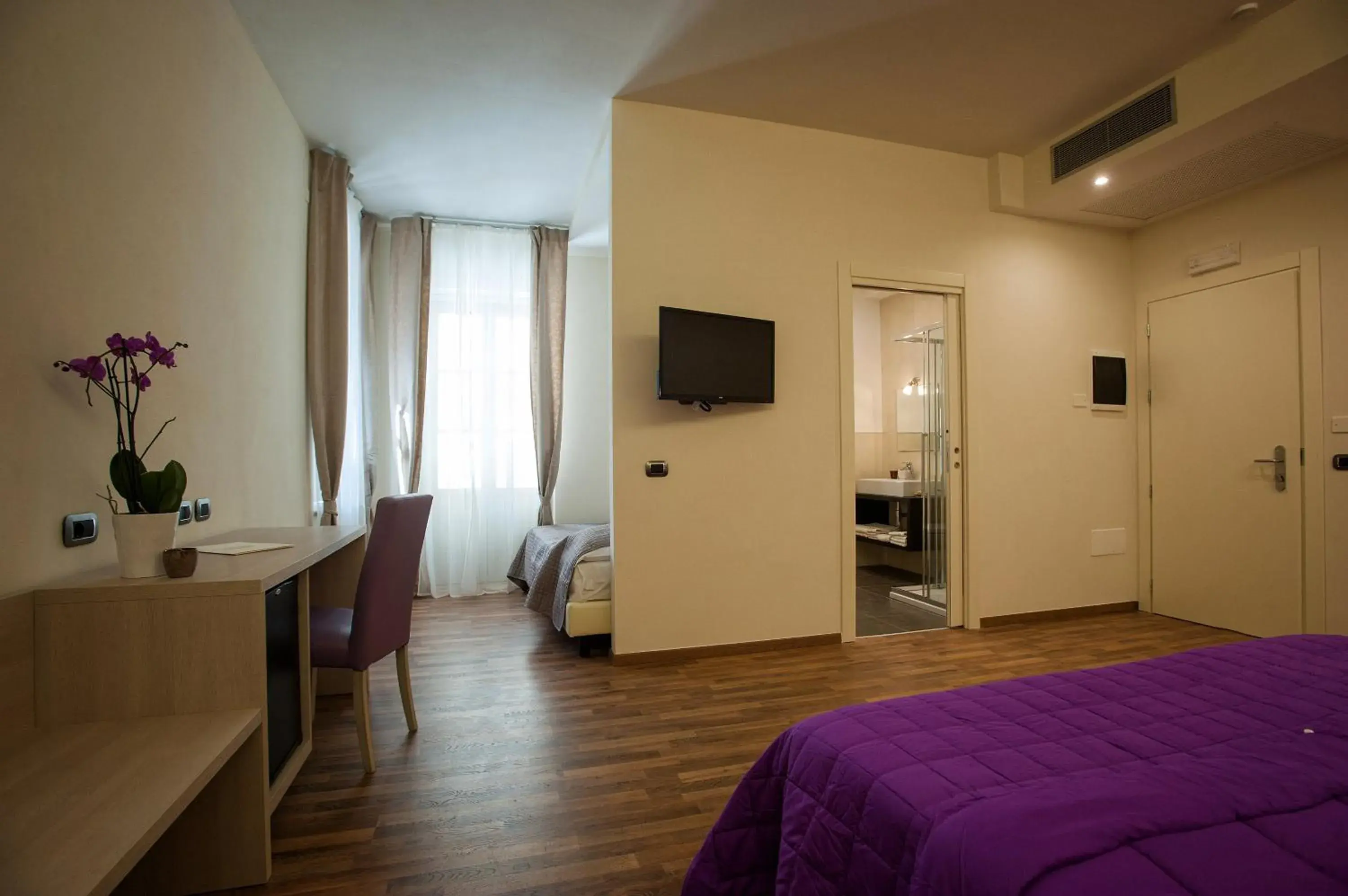 Superior Quadruple Room in Grand Hotel Impero - Wellness & Exclusive SPA Superior Quadruple Room in Grand Hotel Impero - Wellness & Exclusive SPA