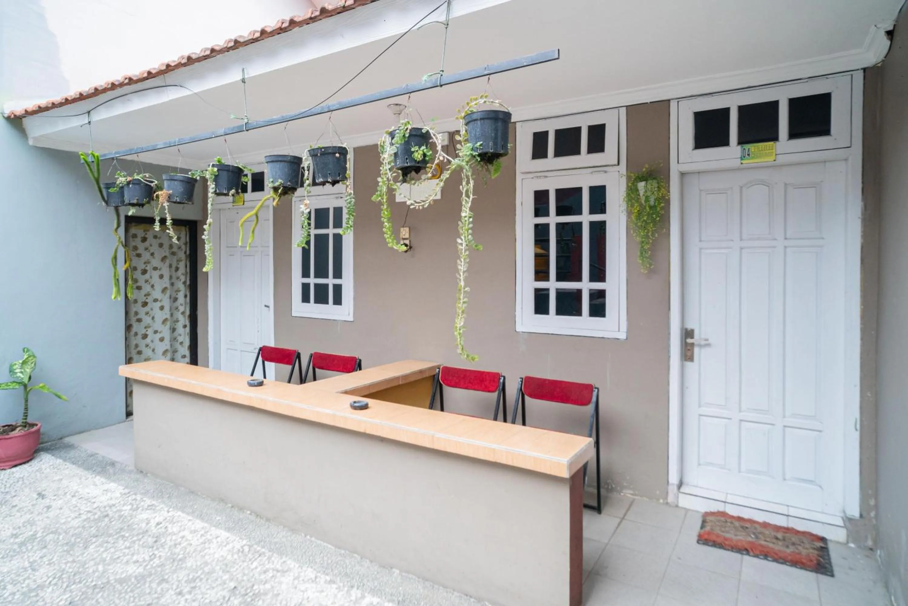 Facade/entrance in RedDoorz at Oro Oro Ombo Batu