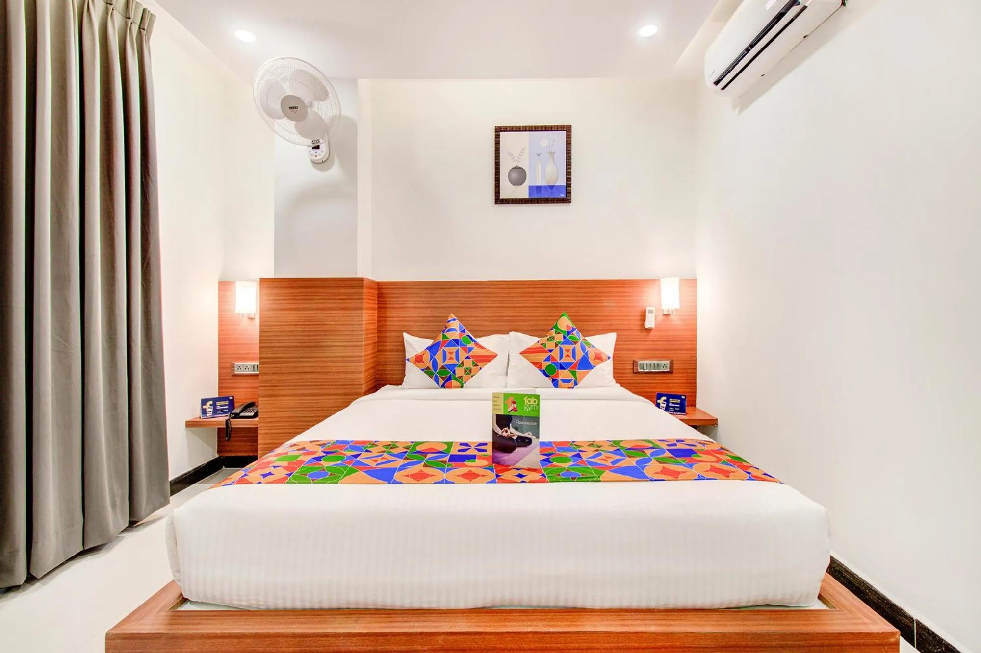 Bed in FabHotel The Royal Suites - Nr Gopalan innovation mall
