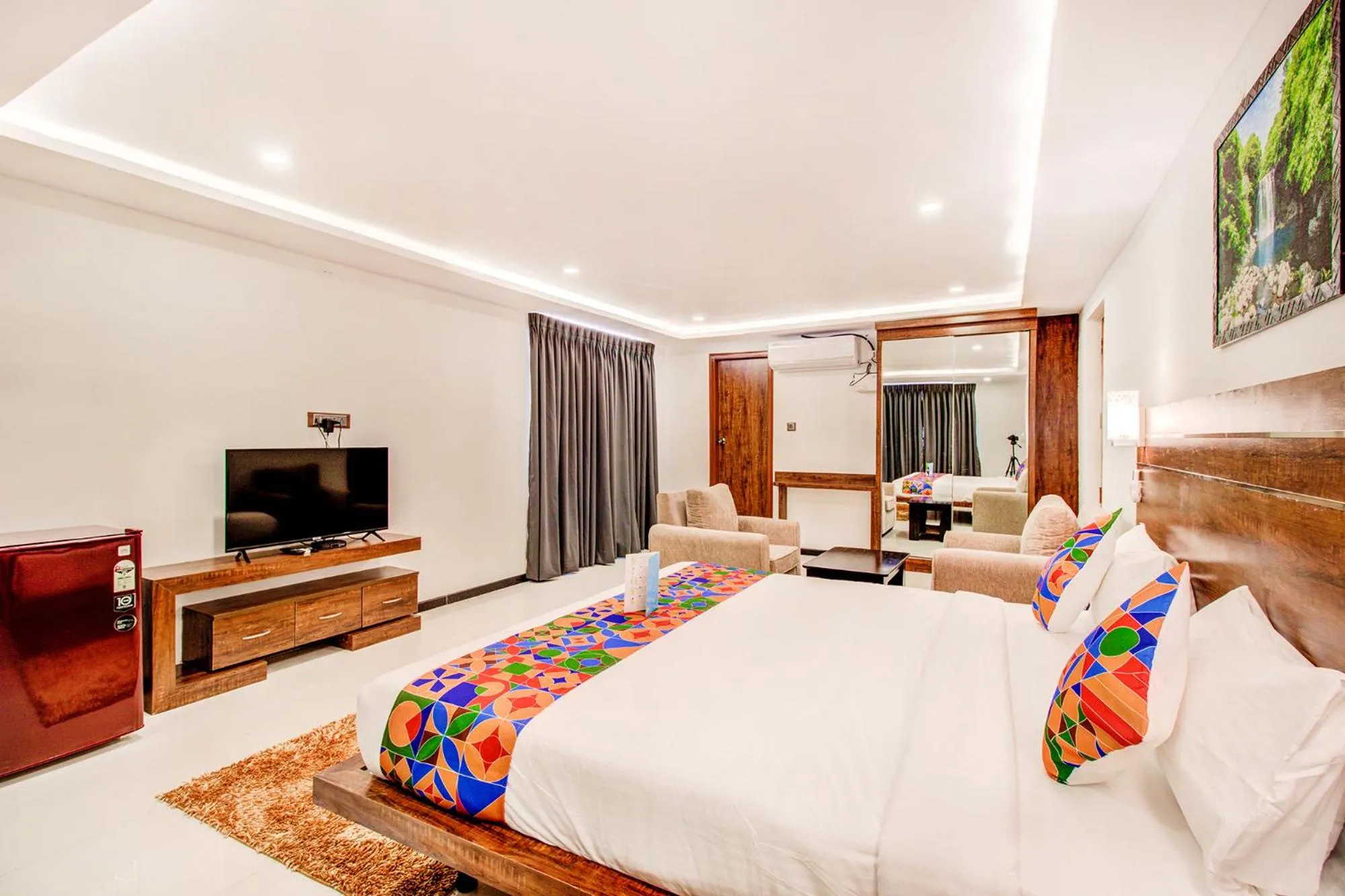 Bed in FabHotel The Royal Suites - Nr Gopalan innovation mall