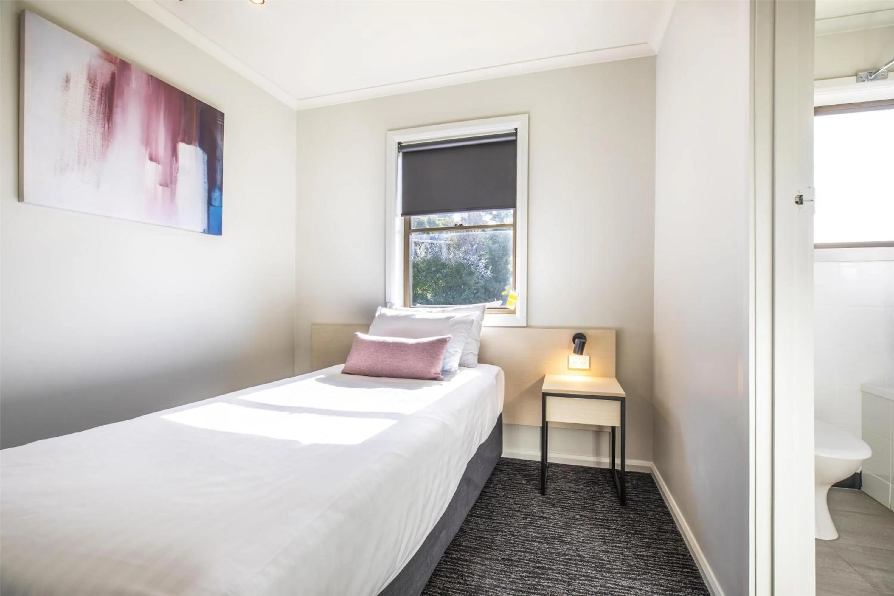 Bedroom, Bed in Nightcap at Riverside Hotel