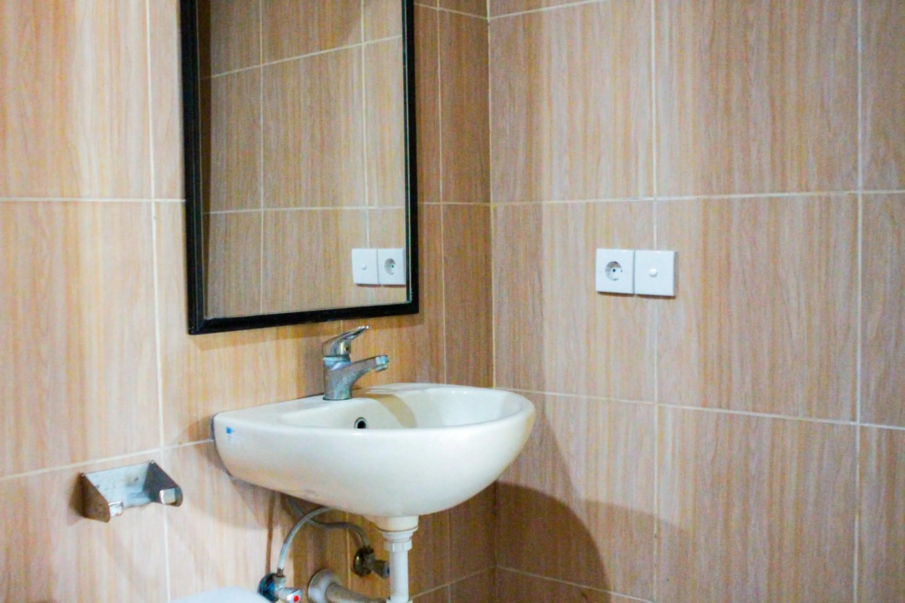 Bathroom in Putu Guest House 2