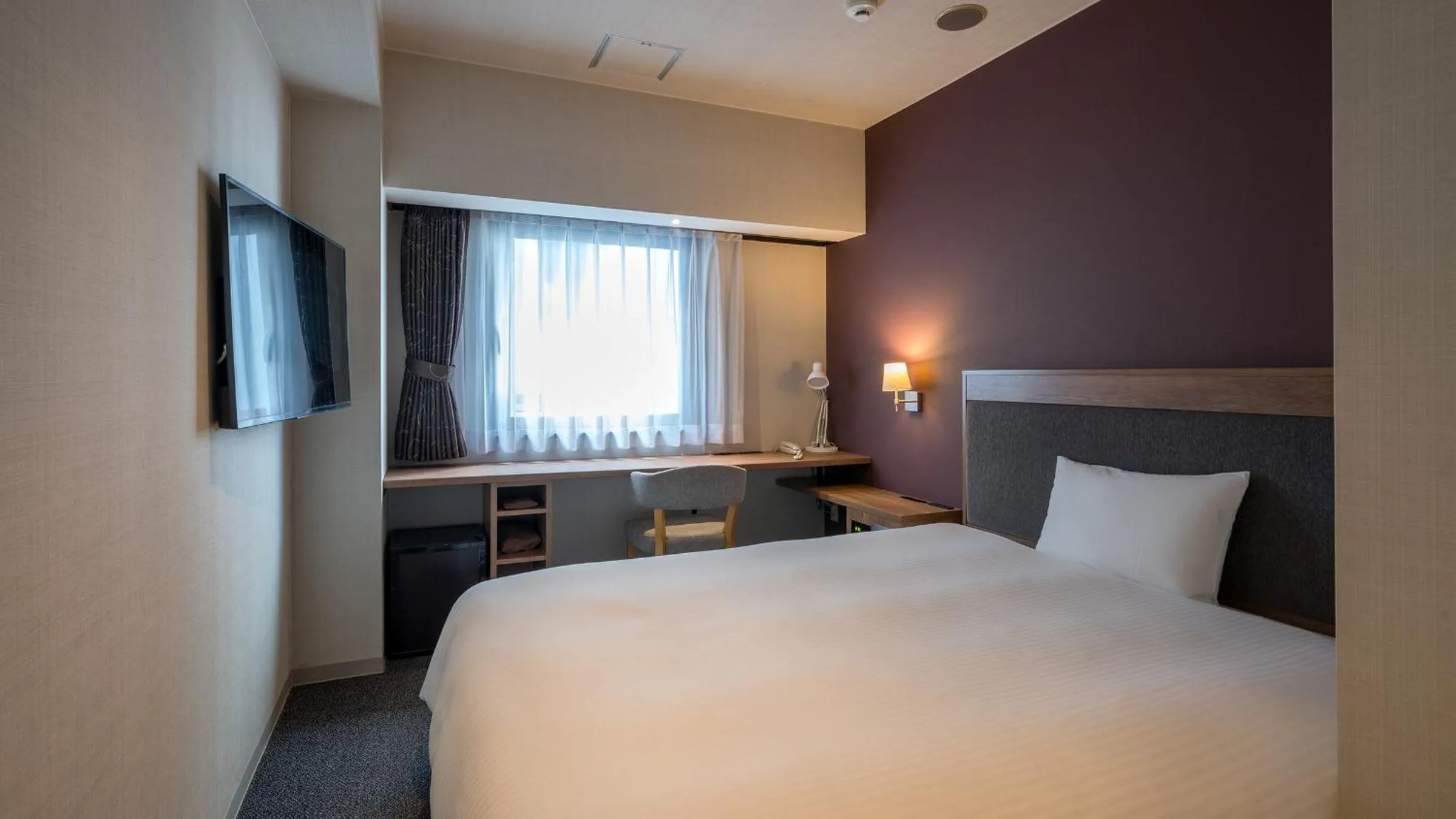 Bed in Hotel The Grand Court Tsunishi