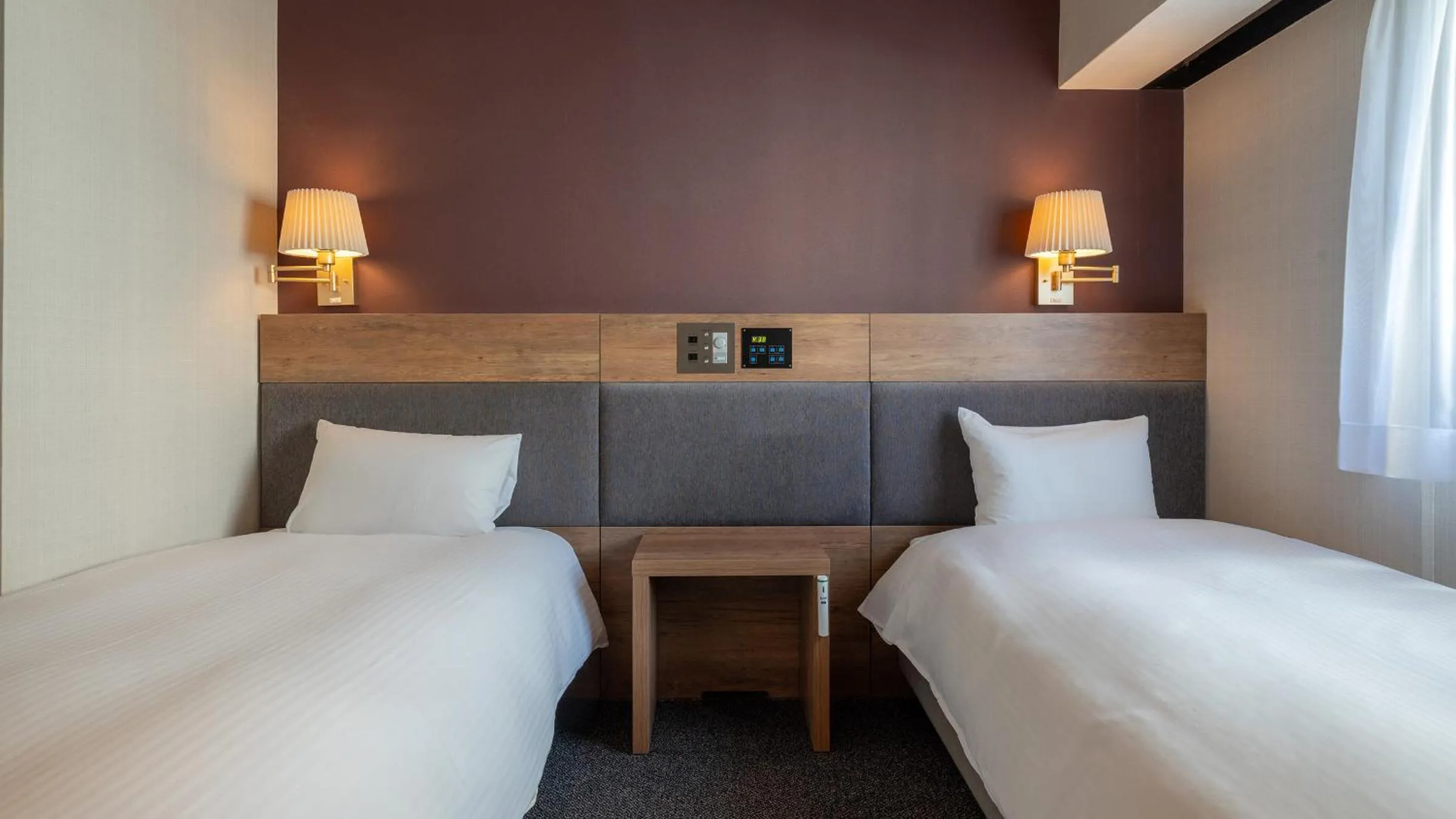 Bed in Hotel The Grand Court Tsunishi