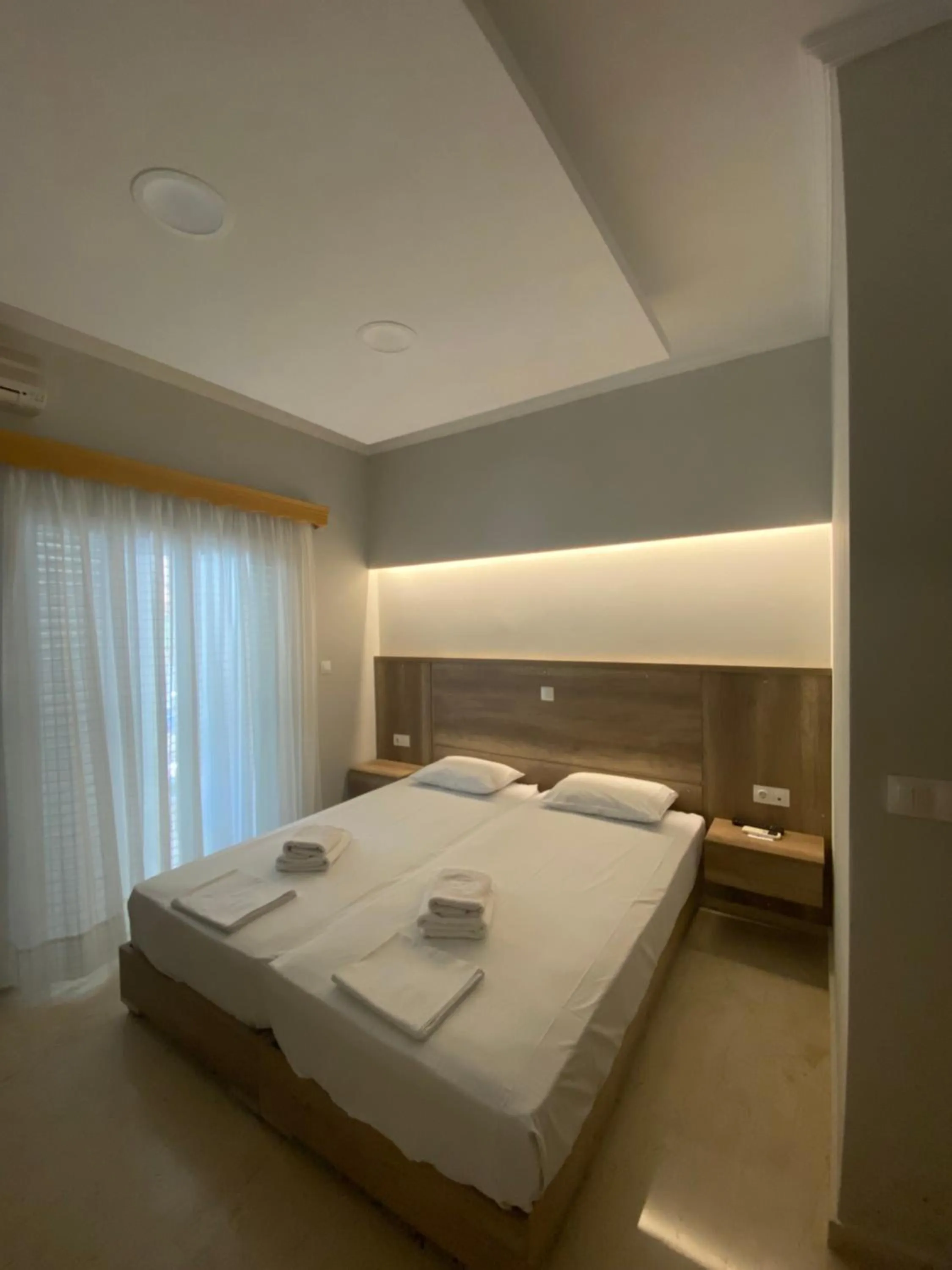 Bed in Hotel Filoxenia