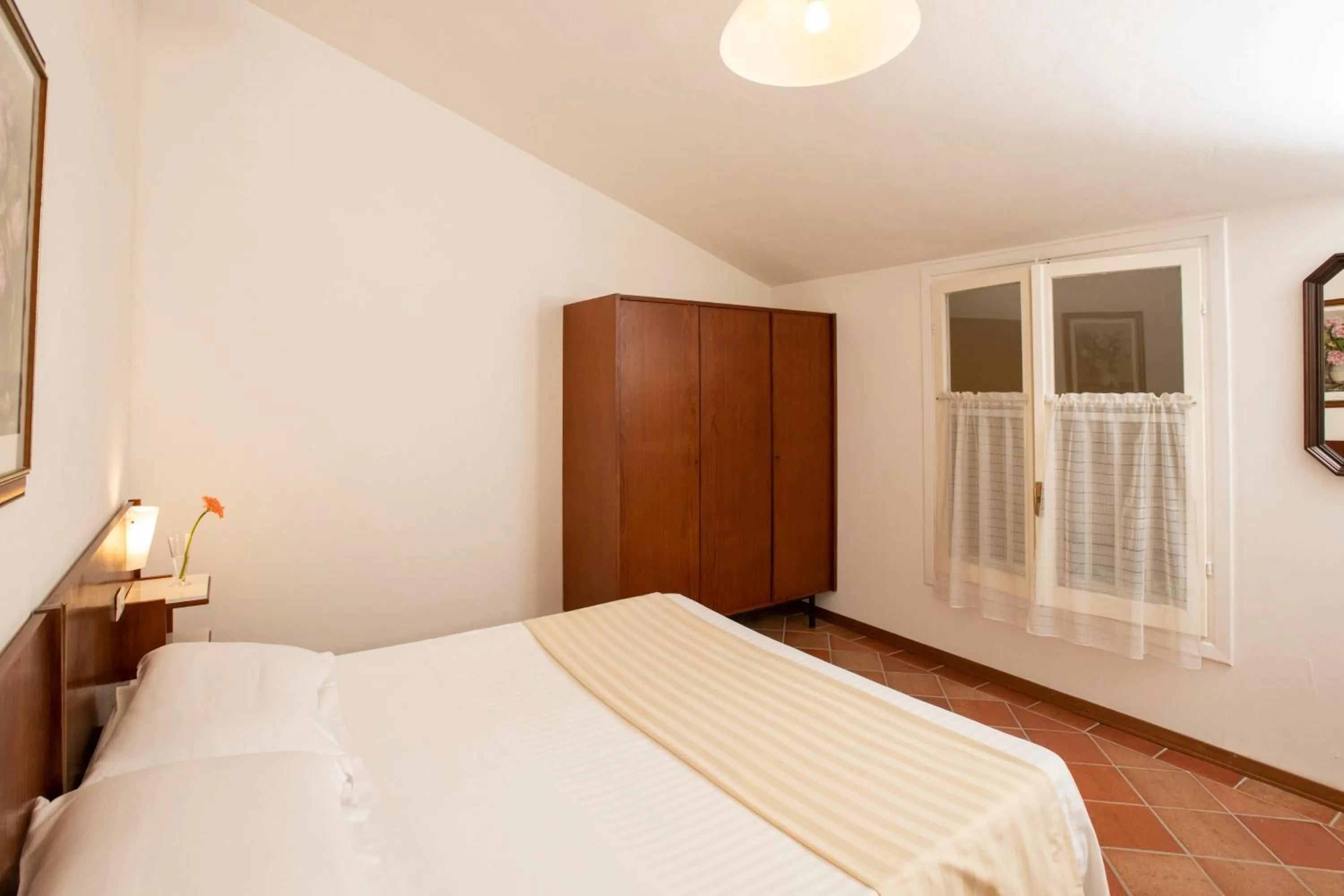 Photo of the whole room, Bed in I Casali by La Principina