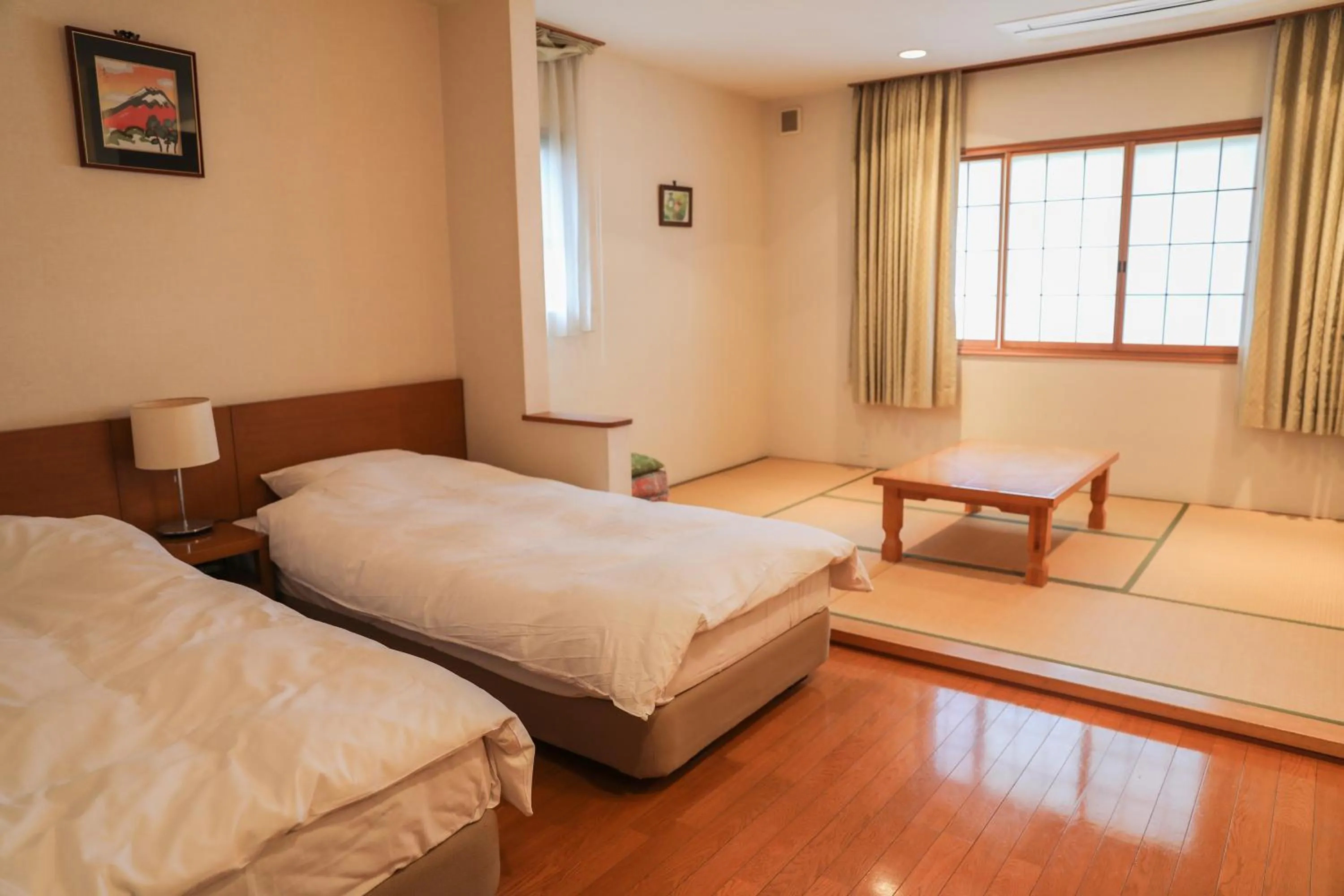 Bed in Ajisai Onsen Ryokan - Award Winning Private Open Air Onsen