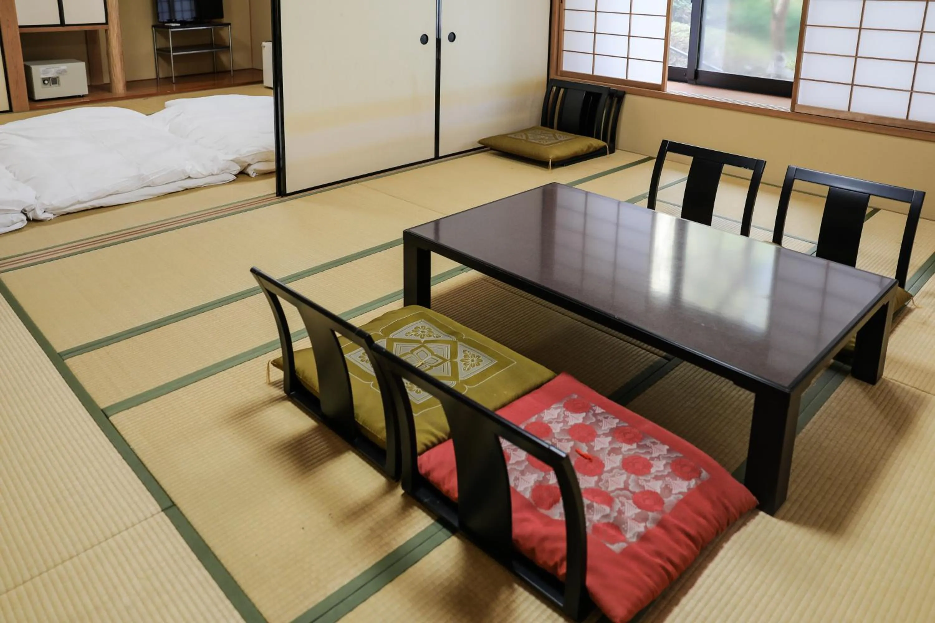 Bed in Ajisai Onsen Ryokan - Award Winning Private Open Air Onsen