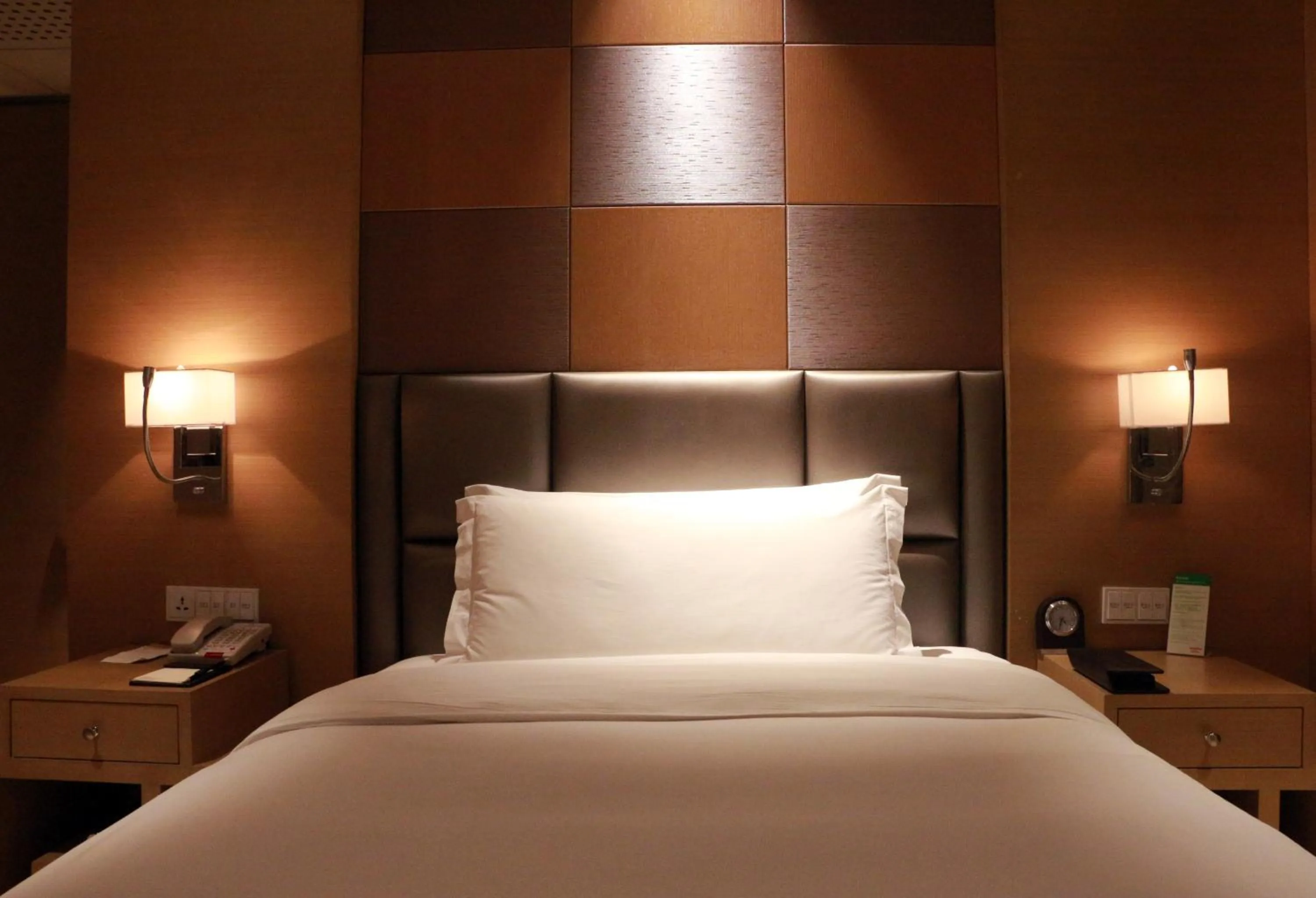 Bed in Movenpick Hotel Enshi