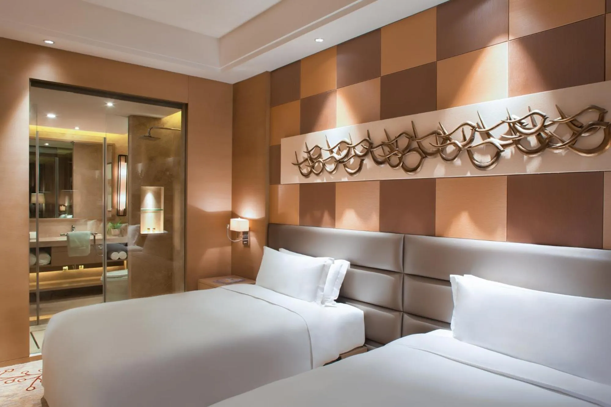 Bed in Movenpick Hotel Enshi