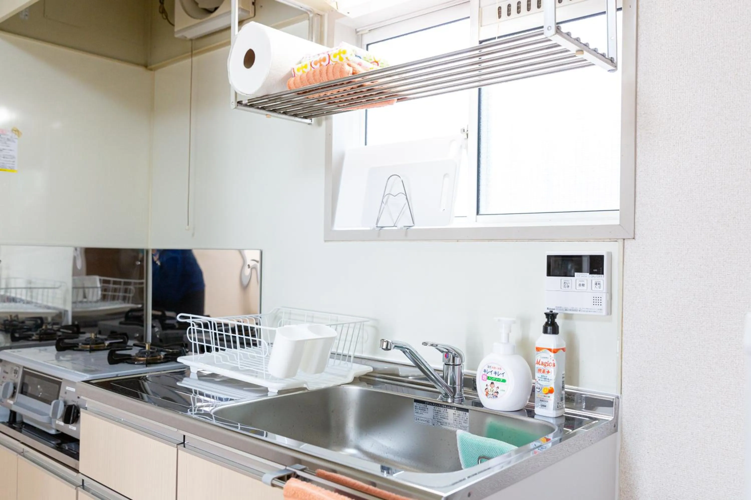 Kitchen or kitchenette in Enoshima Apartment Hotel