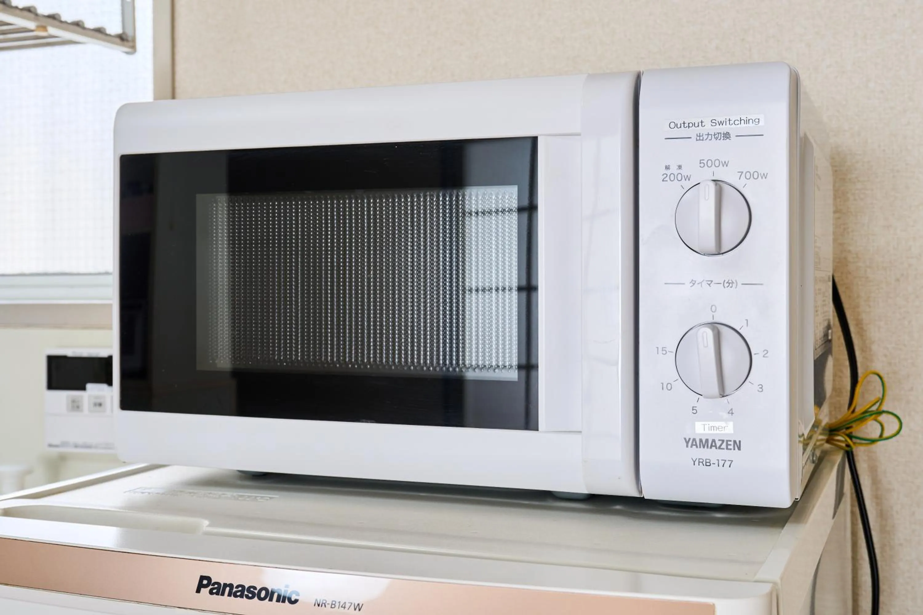 Kitchen or kitchenette in Enoshima Apartment Hotel