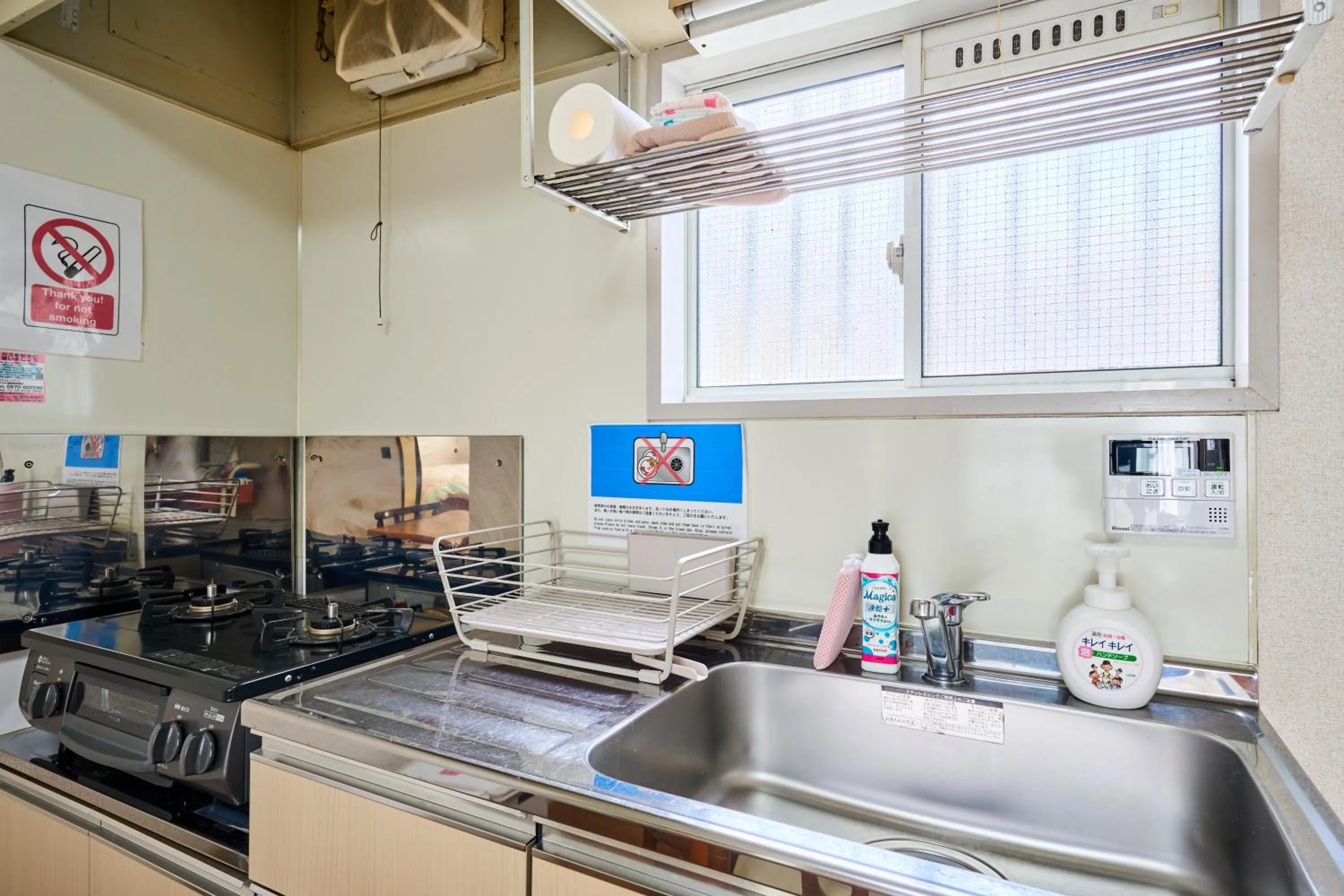 Kitchen or kitchenette in Enoshima Apartment Hotel