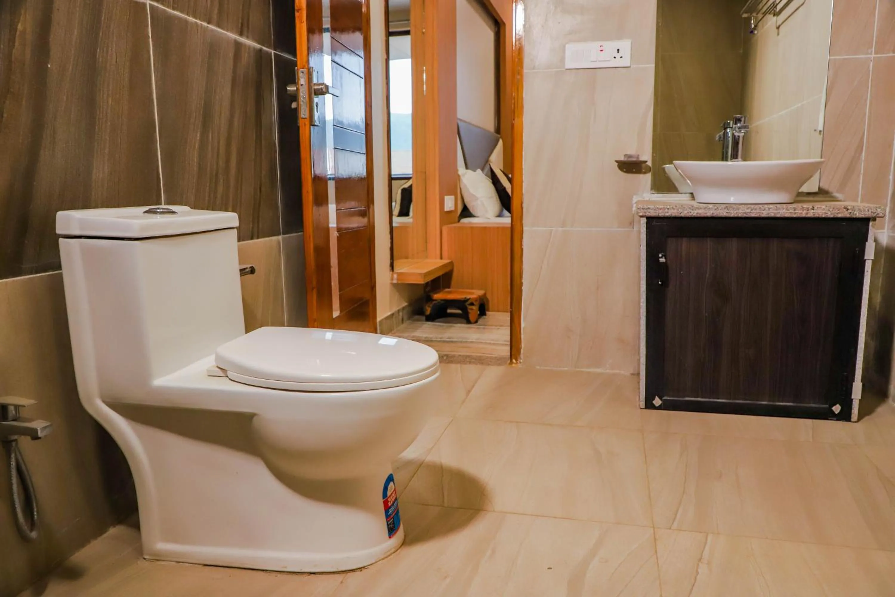 Bathroom in Komal Inn