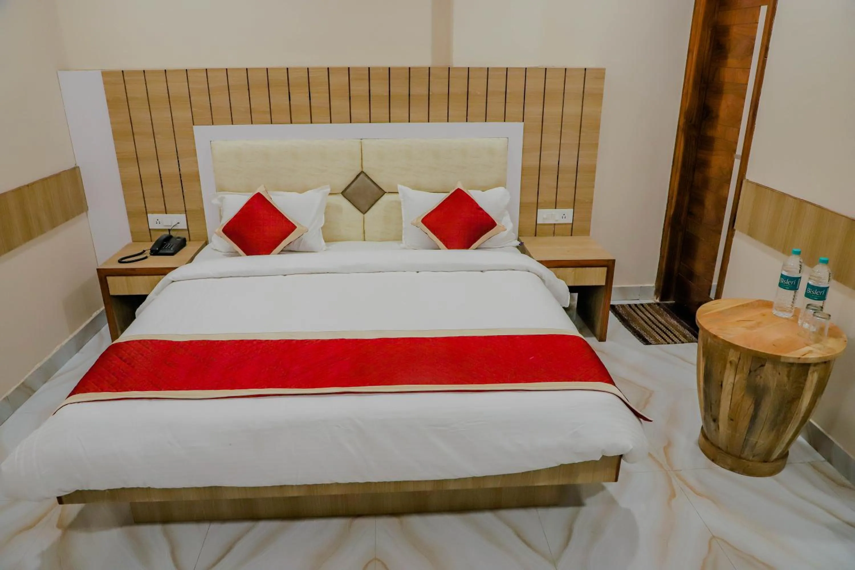 Bed in Komal Inn