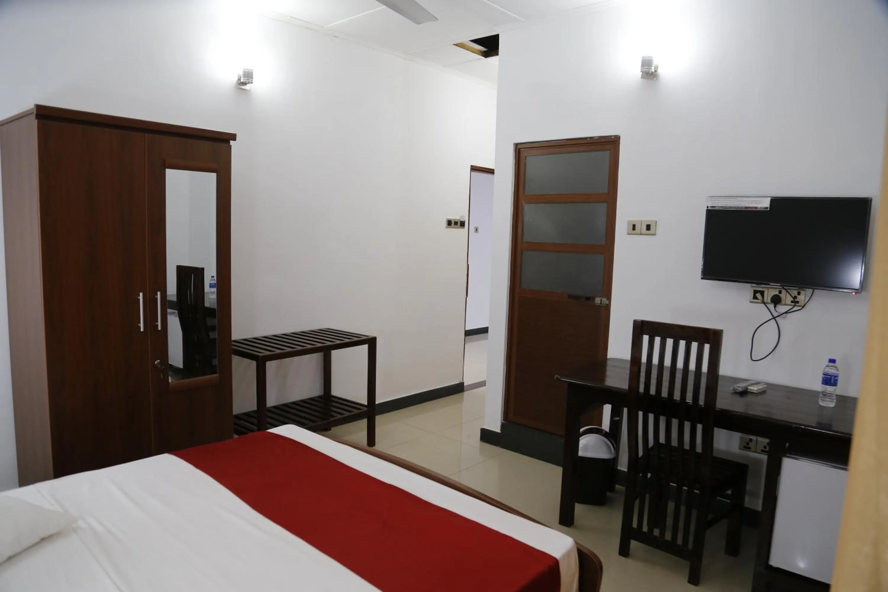 Photo of the whole room, Bed in Ananthi HOTELS