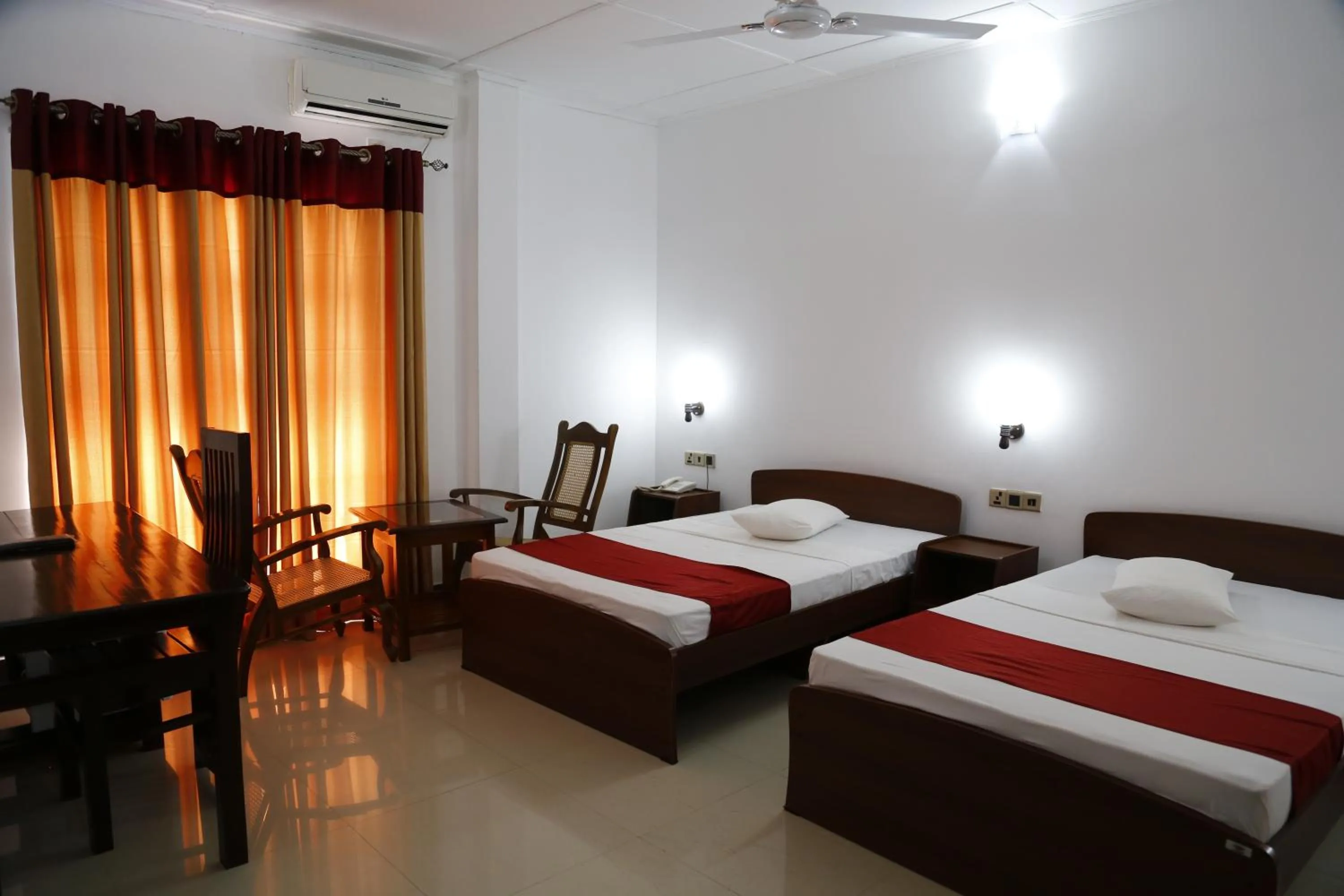 Photo of the whole room, Bed in Ananthi HOTELS