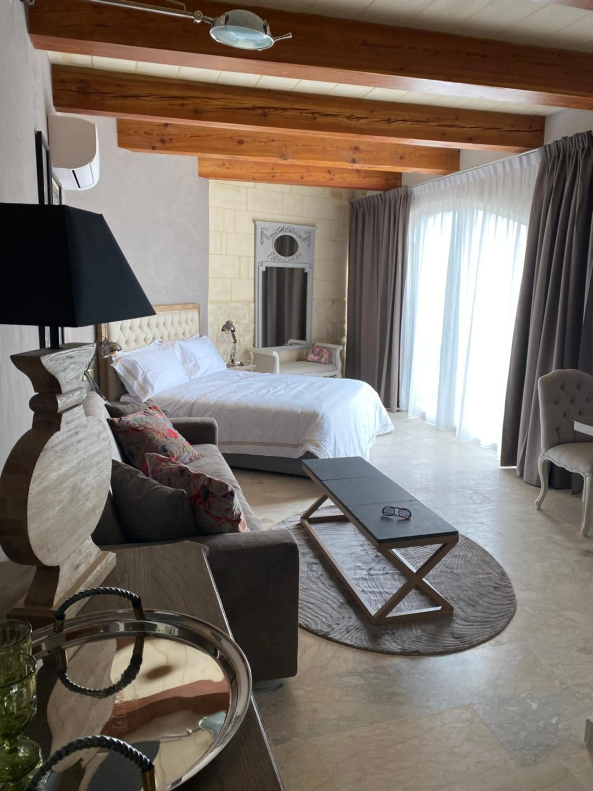 Photo of the whole room, Bed in Lulu Boutique Hotel