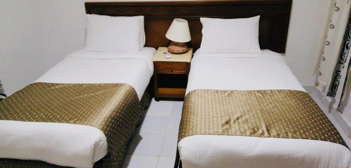 Bed in Green Leaves Hotel