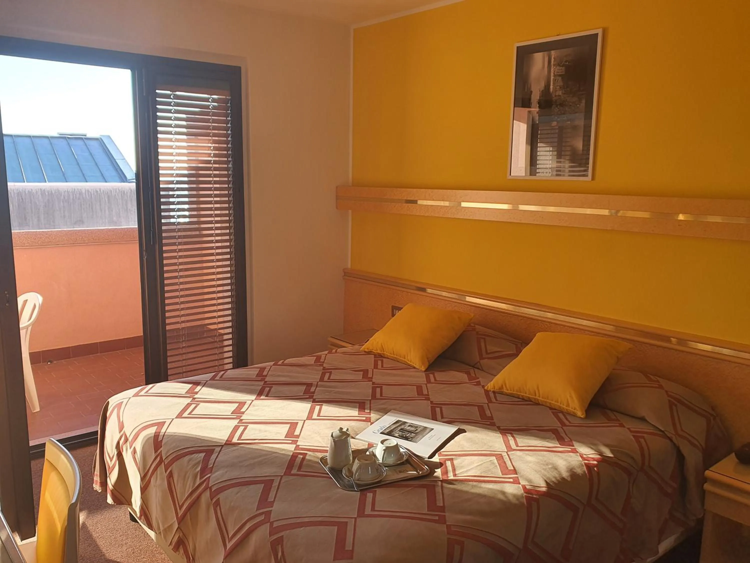 Balcony/Terrace, Bed in Hotel Antares