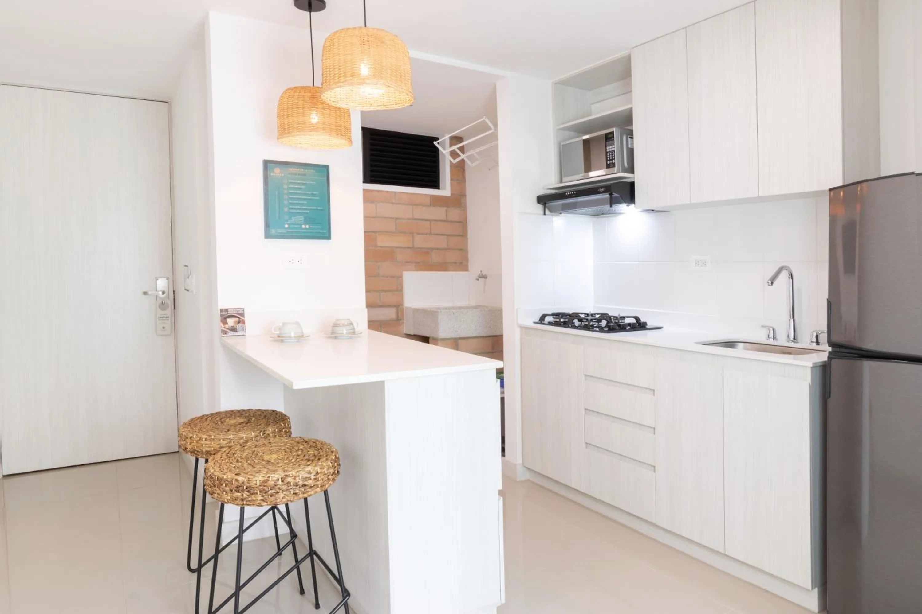 Kitchen or kitchenette in Origen Local Suites