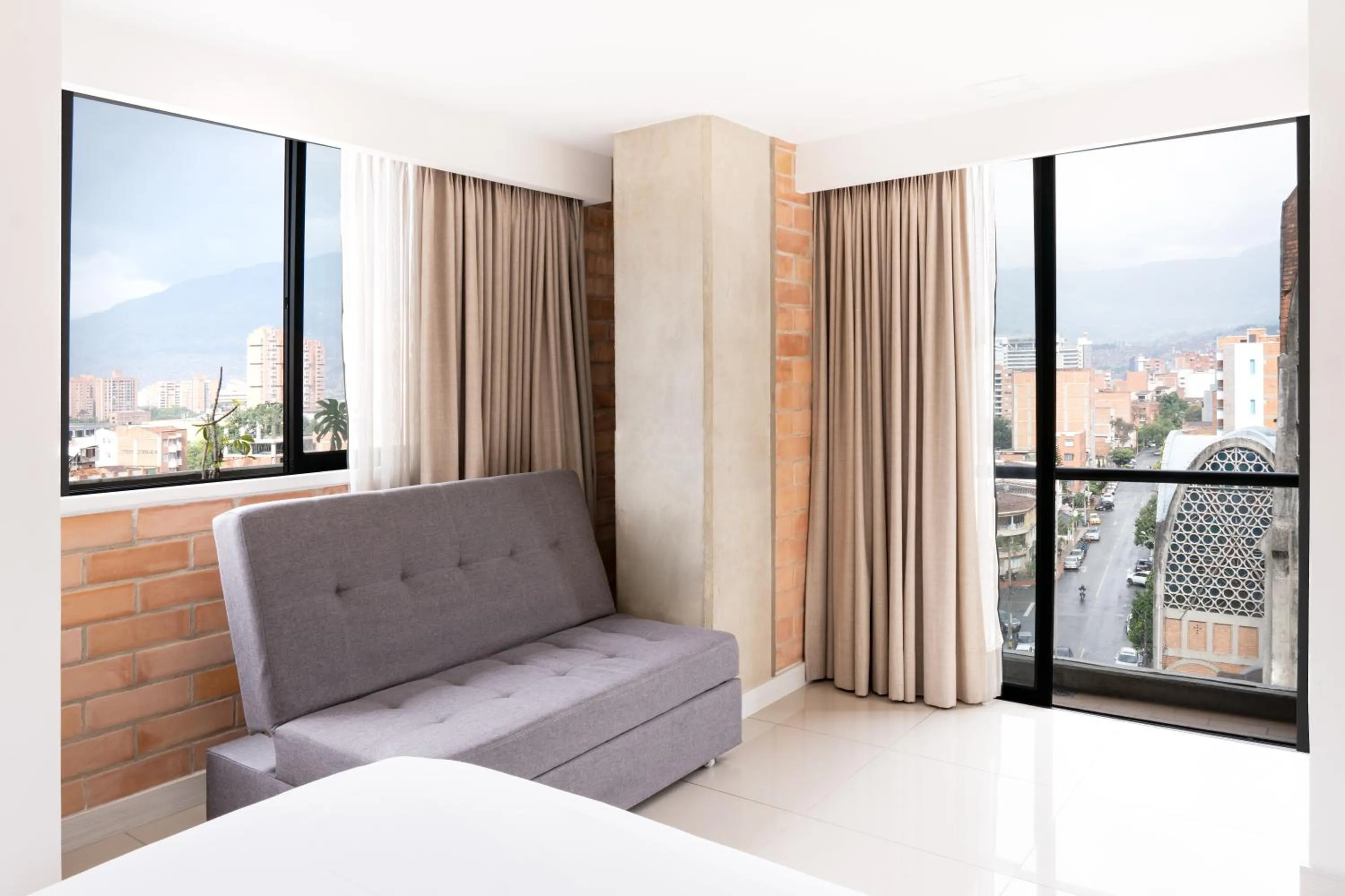 City view, Bed in Origen Local Suites