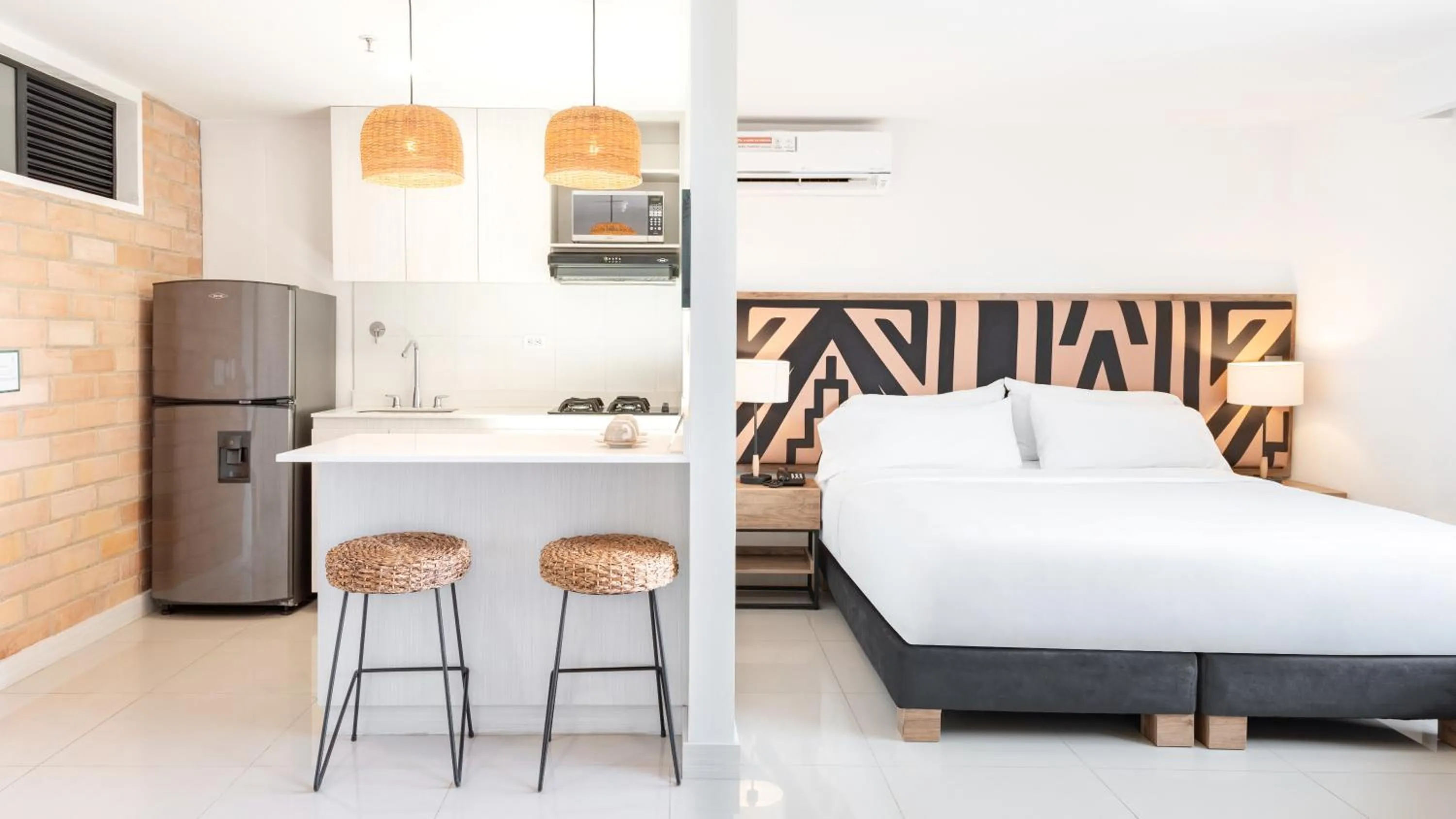 Bed in Origen Local Suites