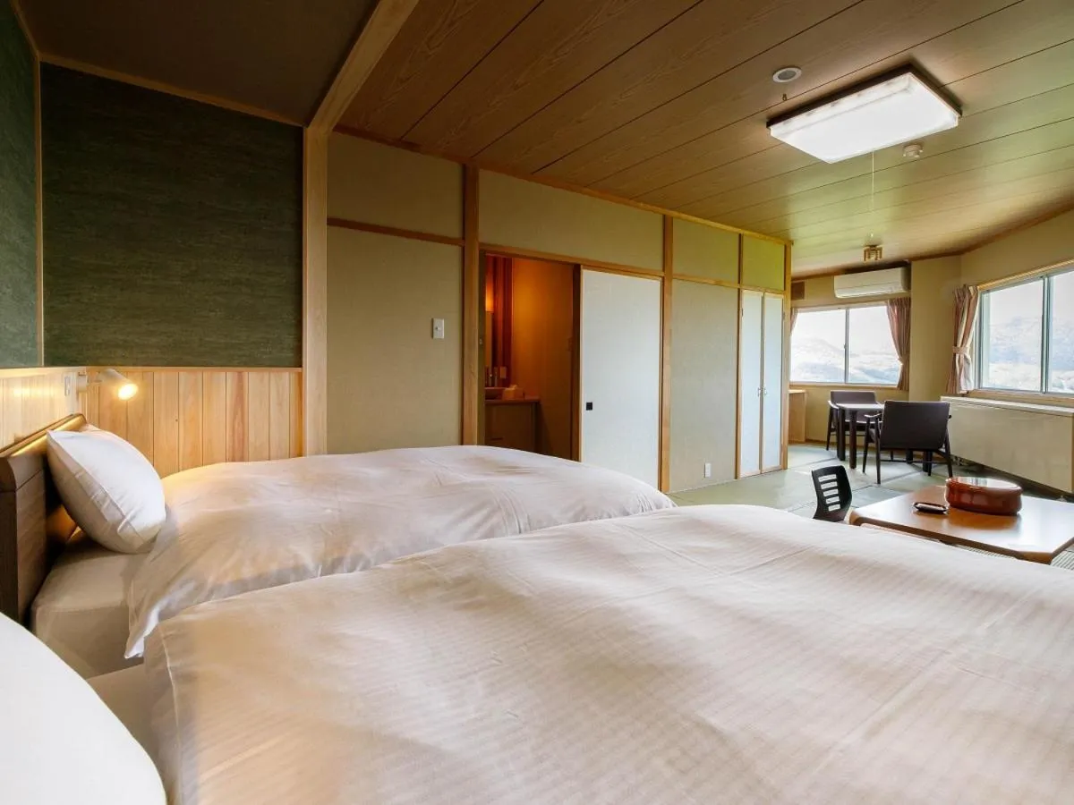 Bed in Hotel Iwasuge