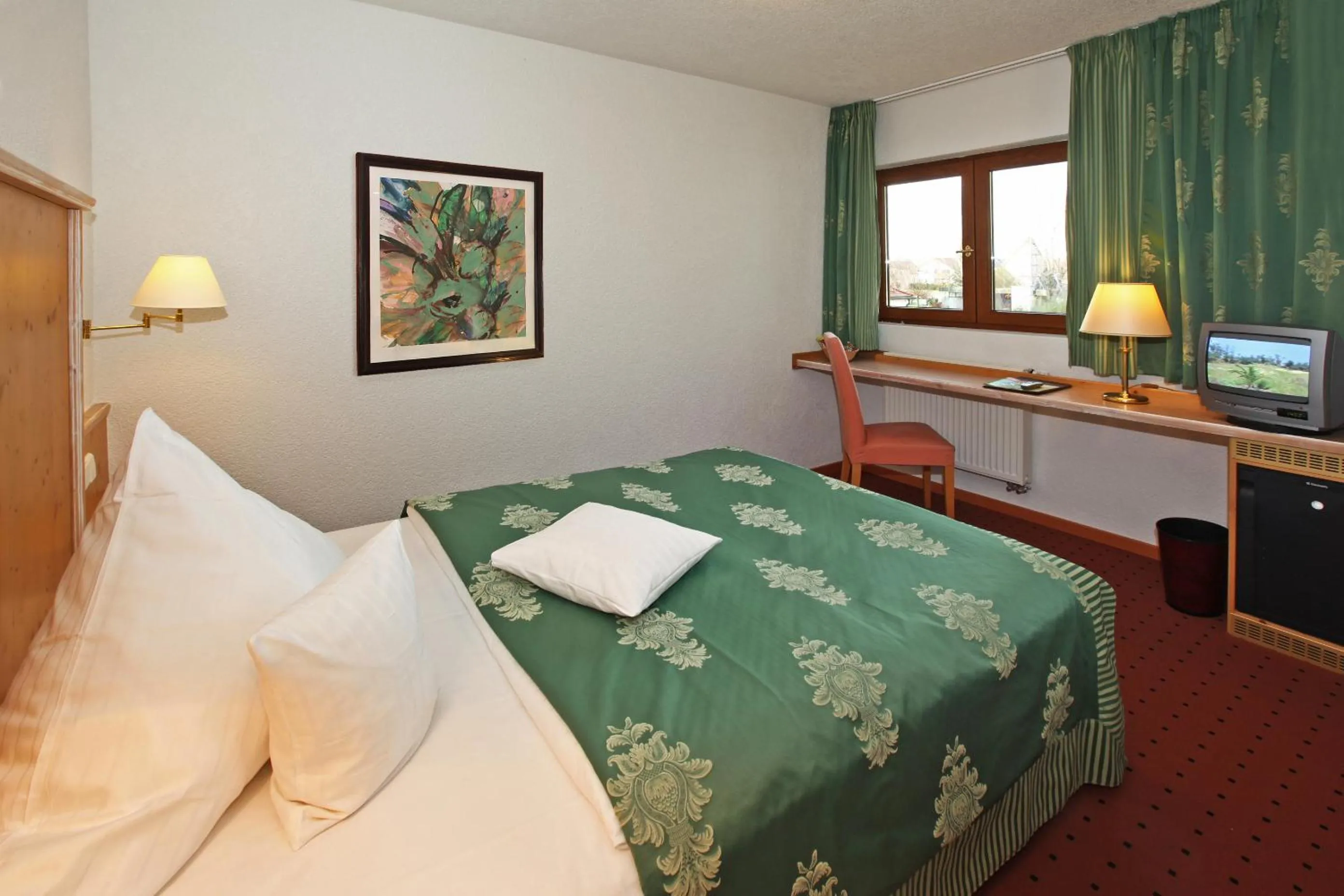 Bed in Hotel Restaurant Adler