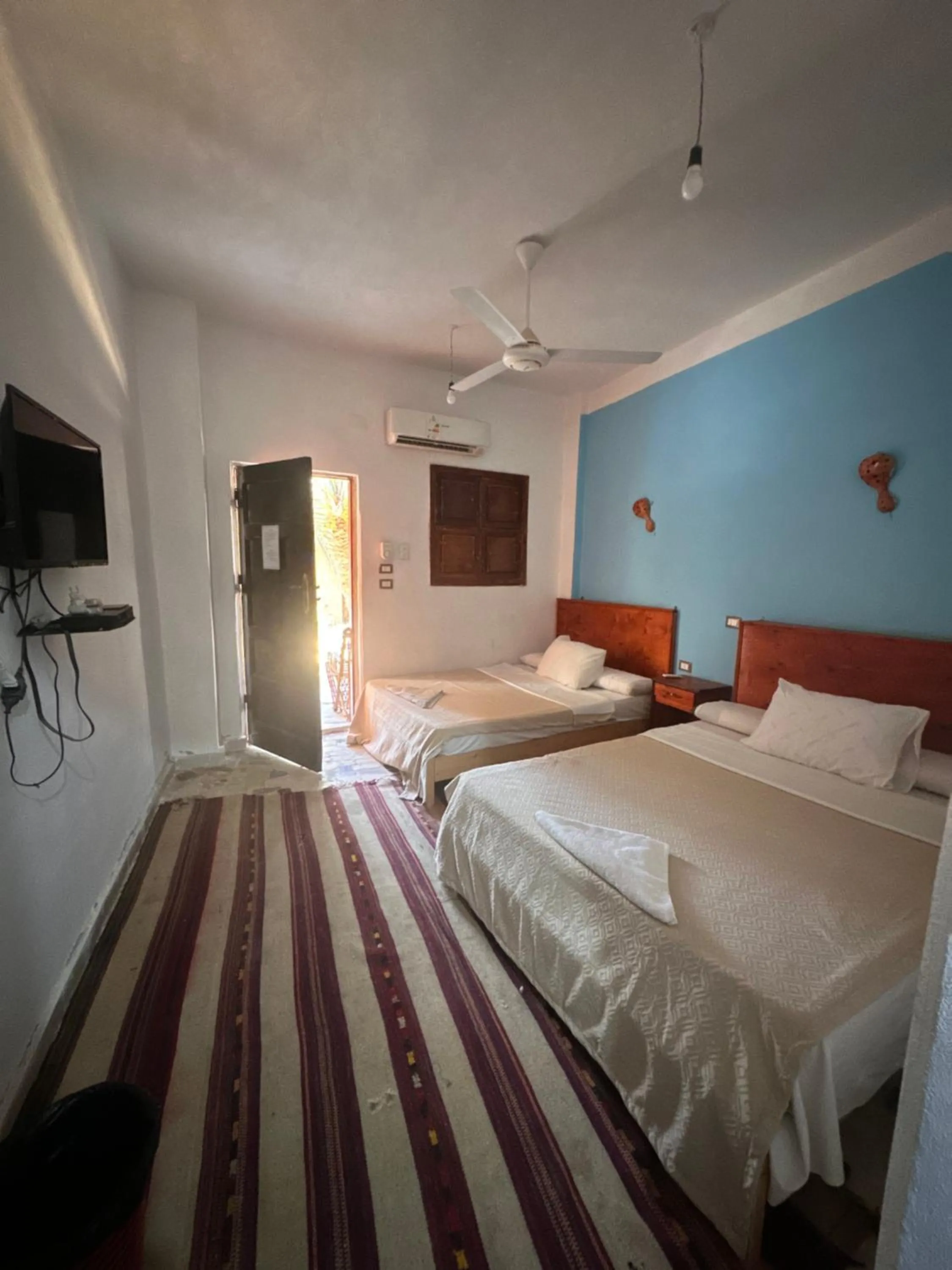 Photo of the whole room, Bed in Nour El Waha Hotel