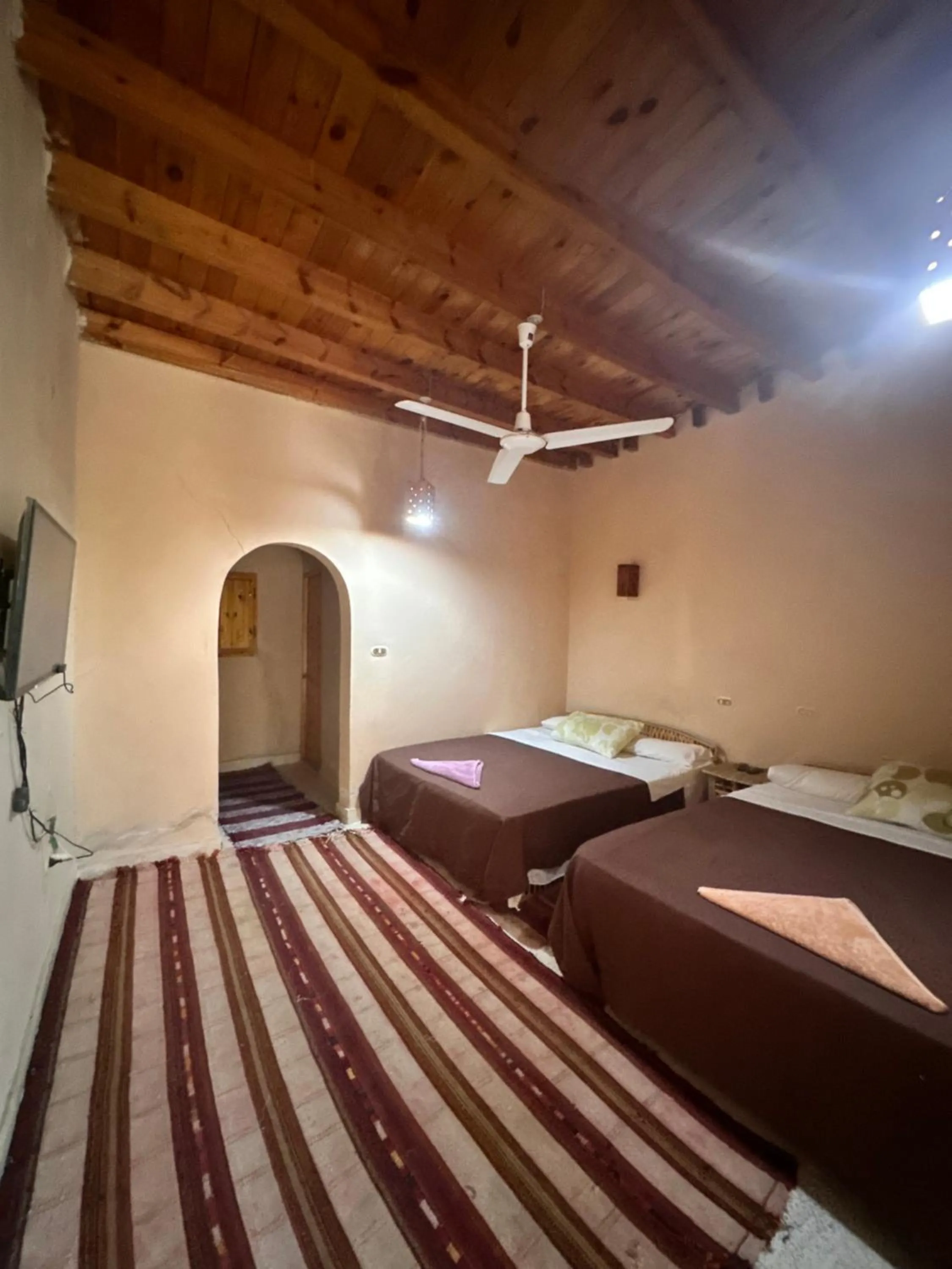 Bed in Nour El Waha Hotel