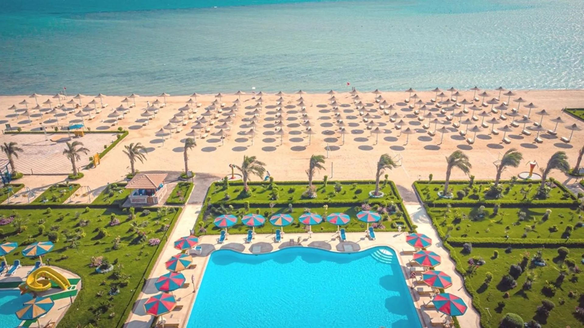 Beach in Hawaii Paradise Aqua Park Resort - Families and Couples Only