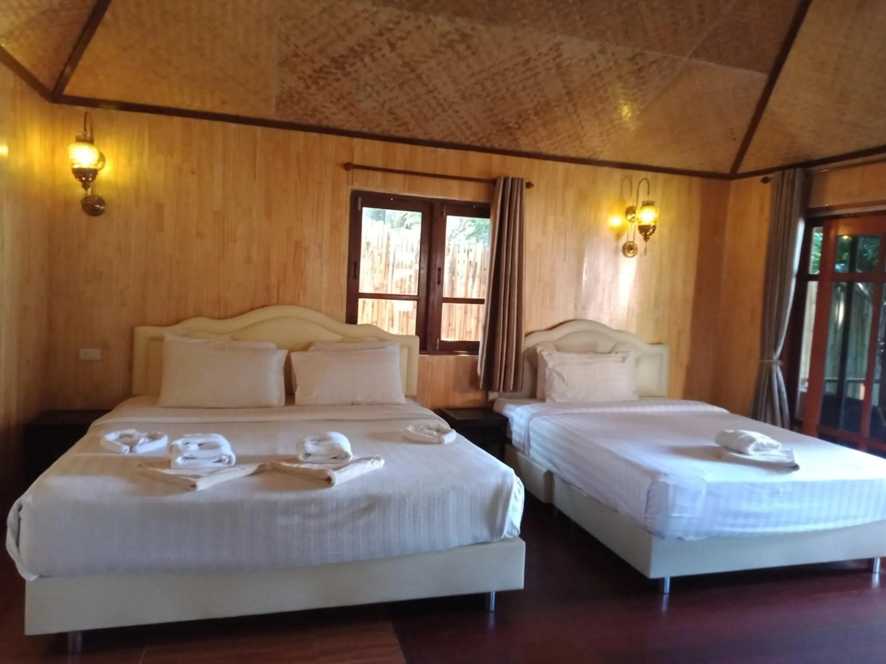 Bed in Bow Thong Beach Resort