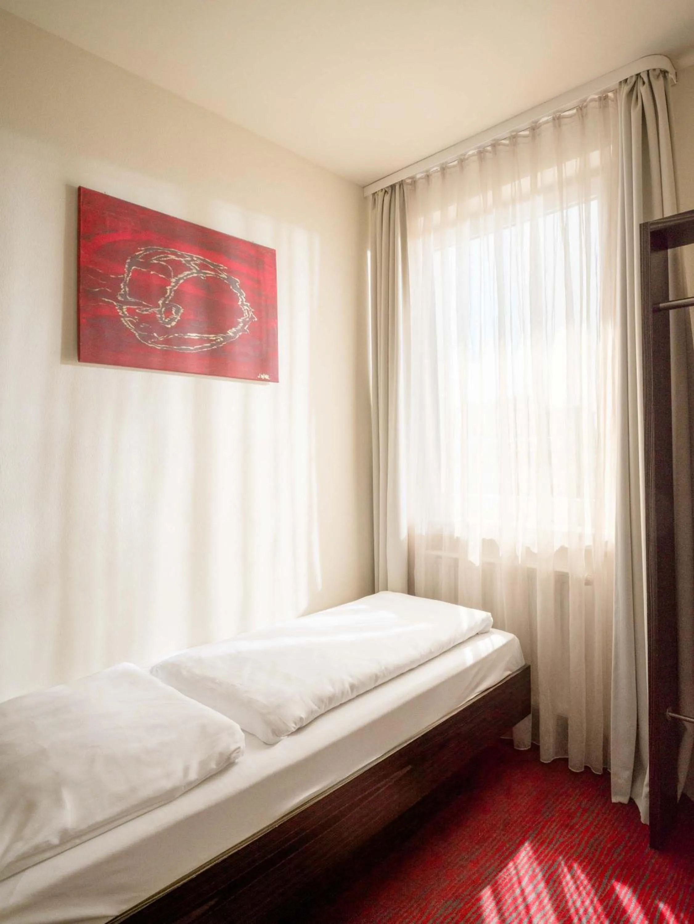 Photo of the whole room, Bed in Hotel Speyer am Technik Museum