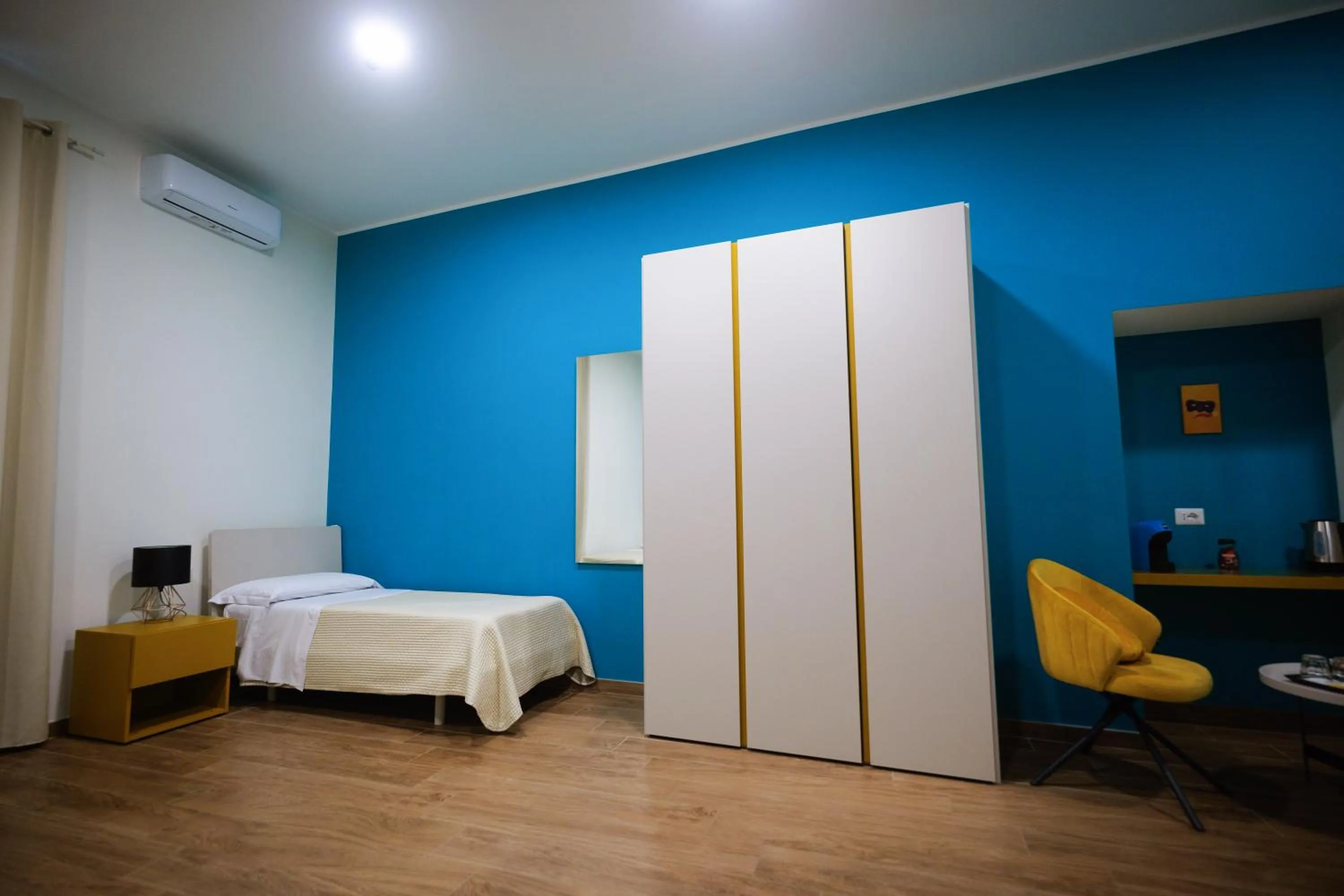 Bed in Terminal 1 Guest House